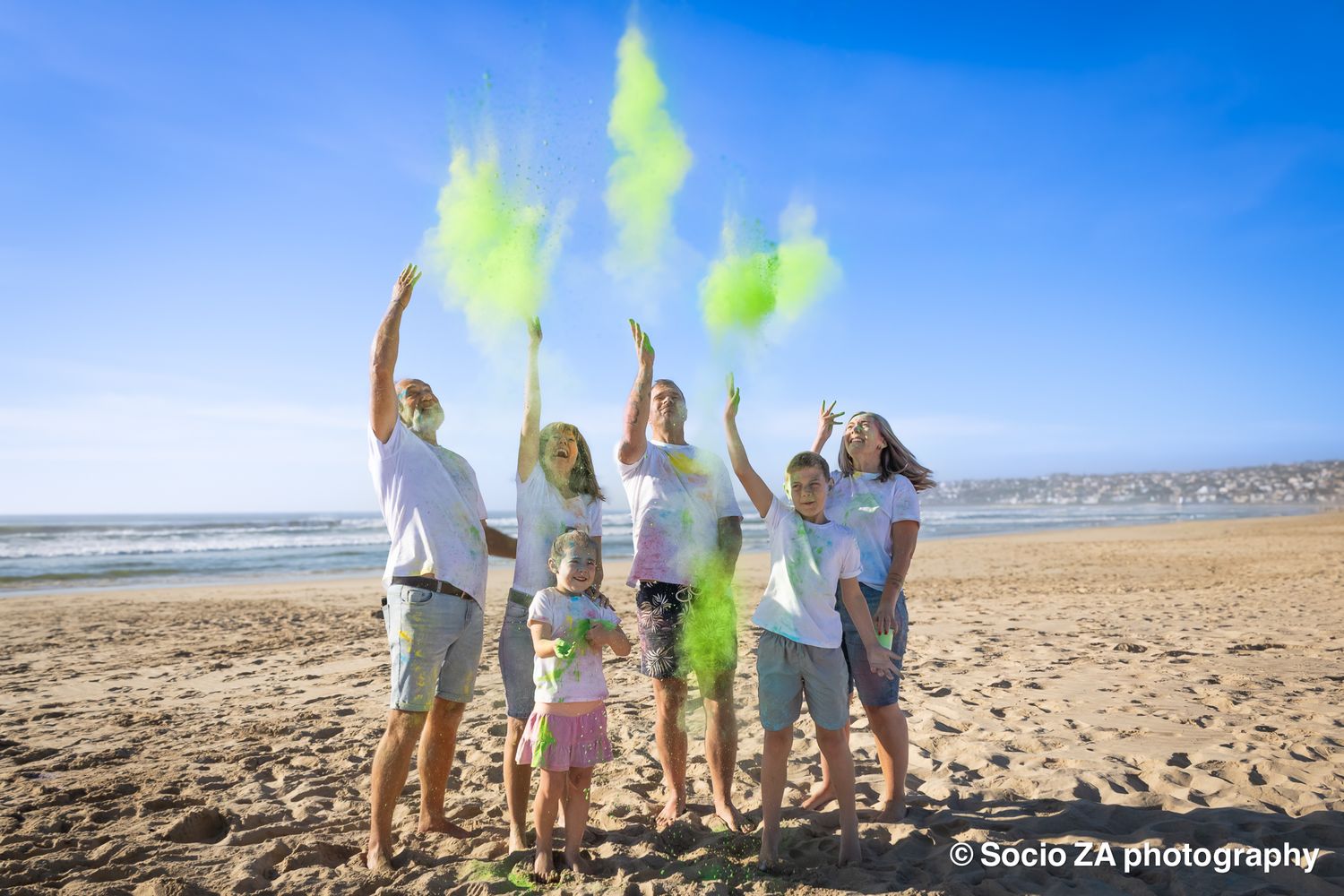 Family colour powder beach photoshoot in Jeffrey's Bay — vibrant and joyful creative session by Socio ZA Photography, Eastern Cape South Afr