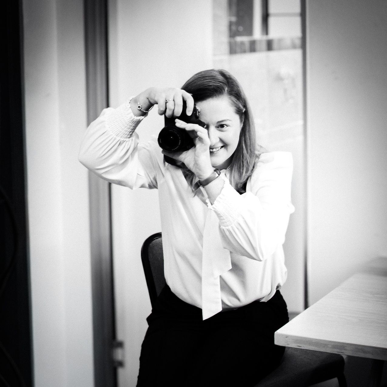 A photograph of a photographer taking pictures with a Canon camera in the Eastern Cape.