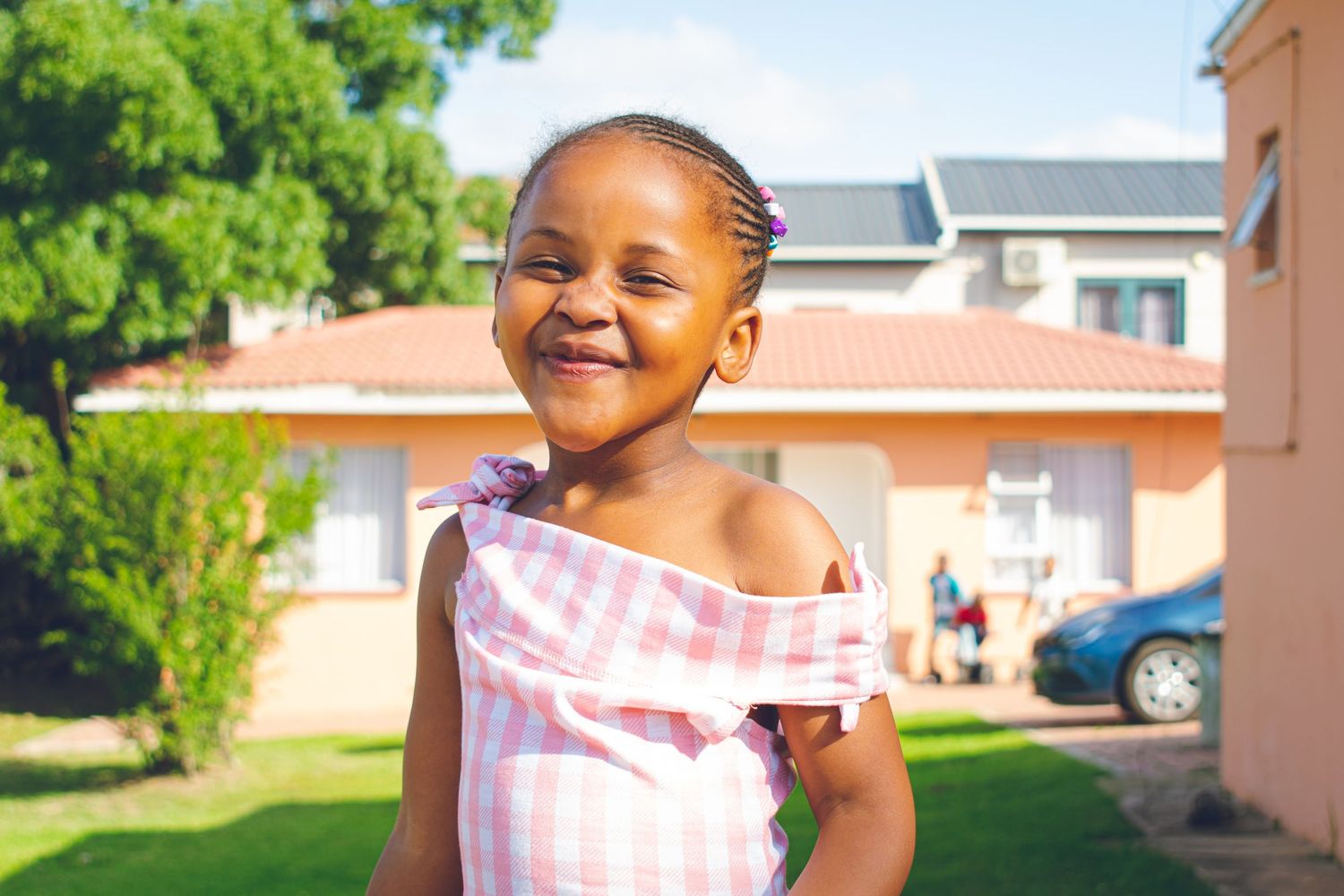 All smiles as a child smiles for a photo. A photoshoot which took place in Mthatha.