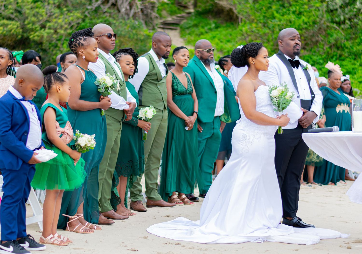 Image of people who were attending a beach white wedding held in the Eastern Cape.