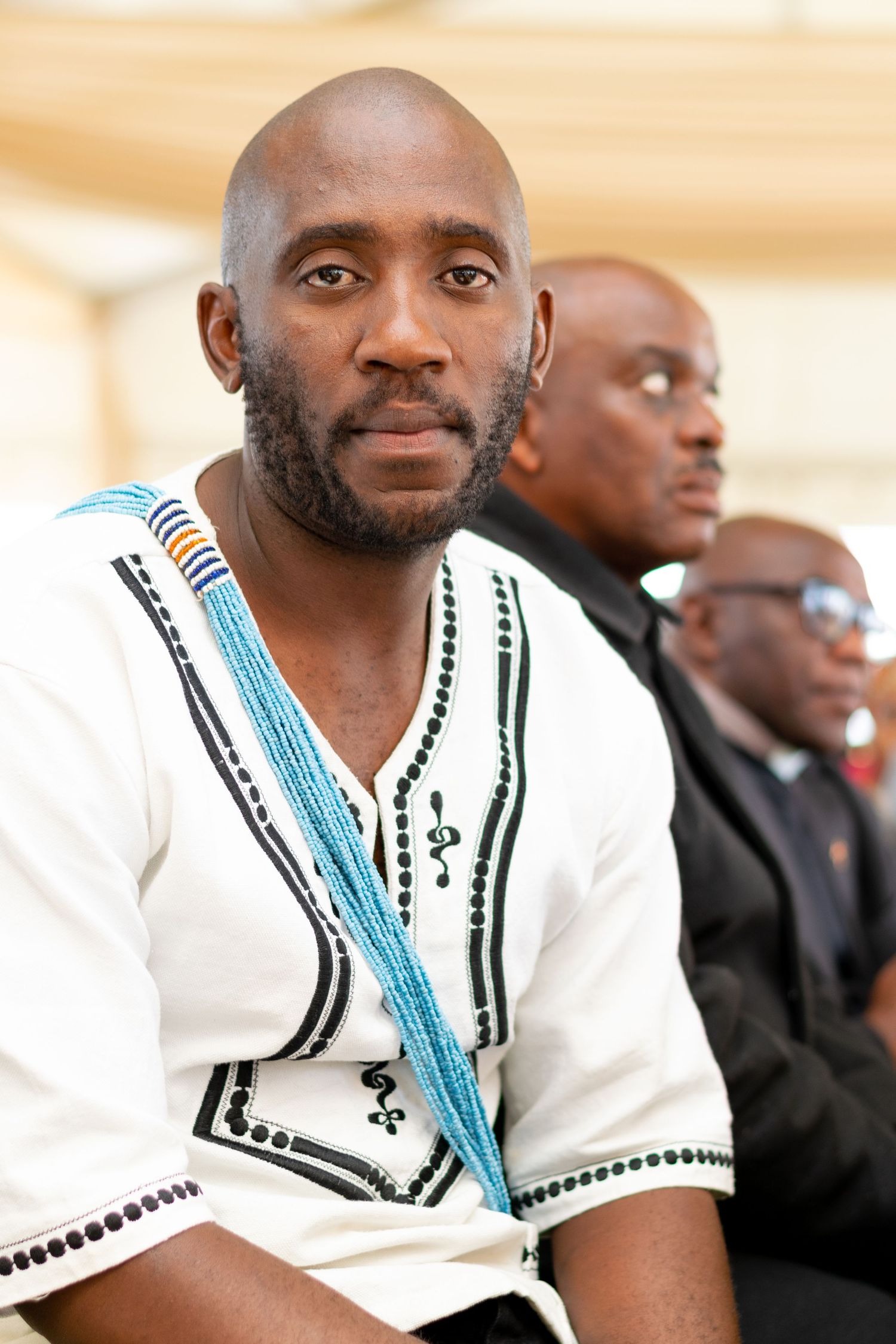 Image of a man taken during a traditional ceremony.