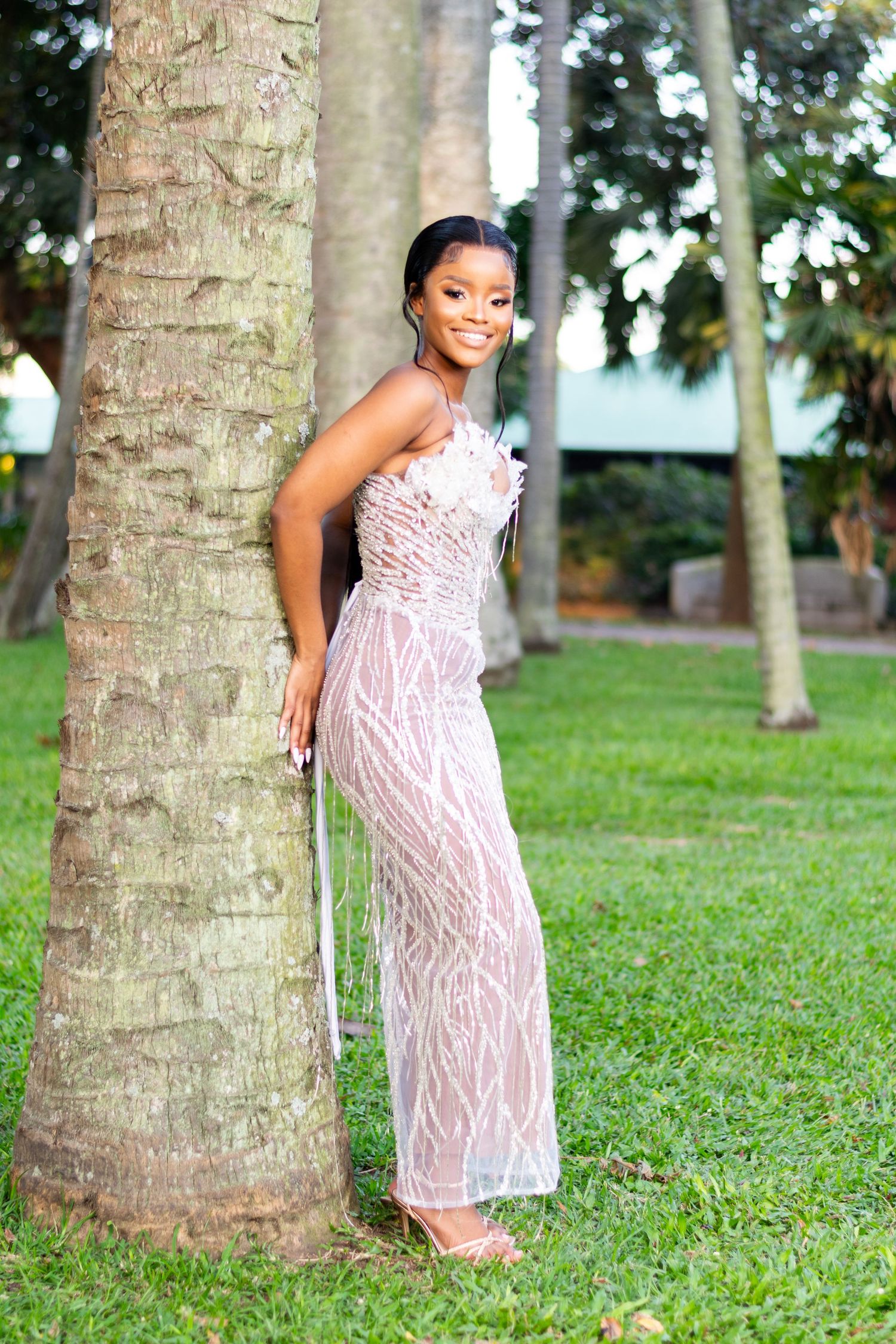 A woman next to a tree for a matric farewell photoshoot in Durban.