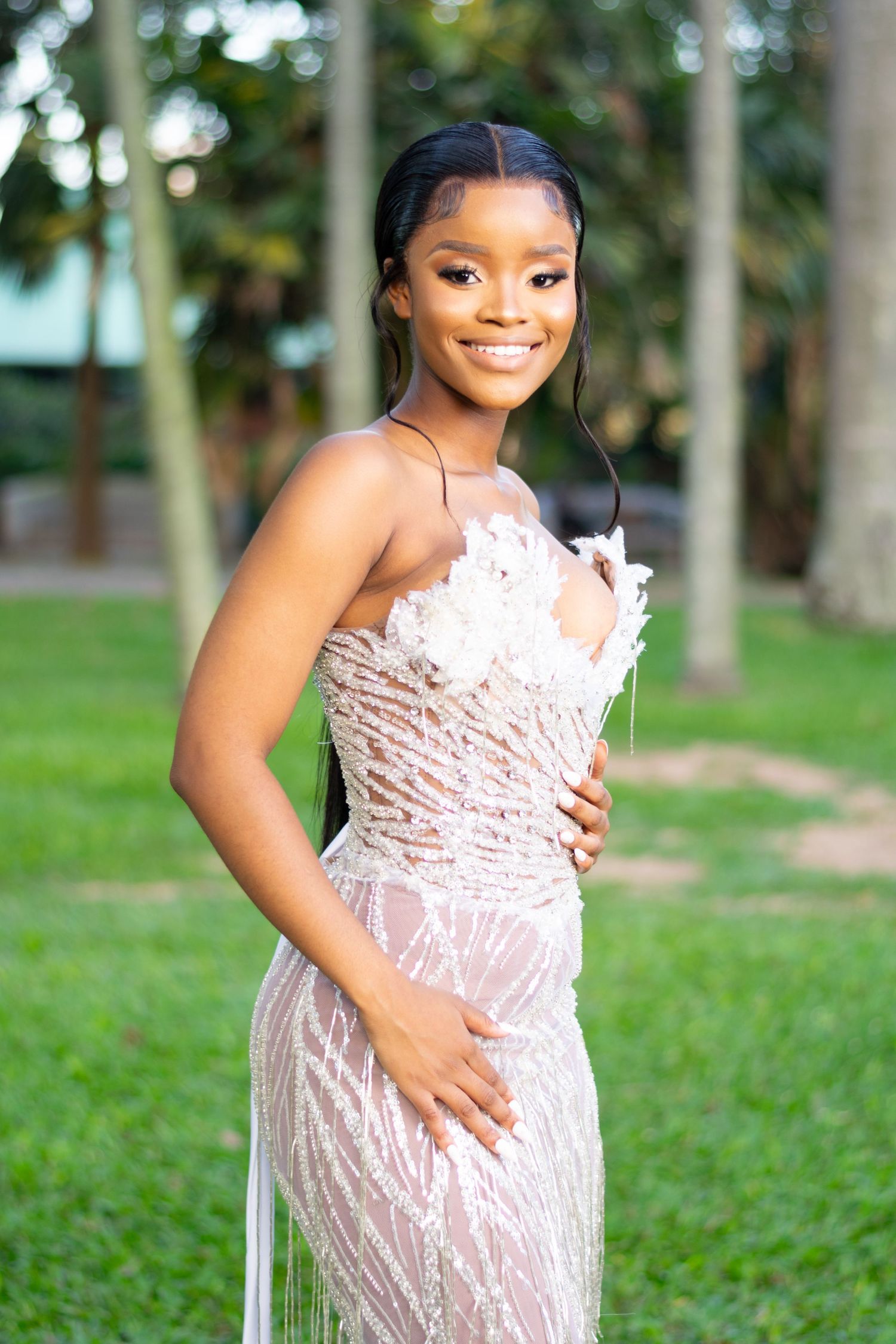 A woman poses for an image during a matric farewell photoshoot.
