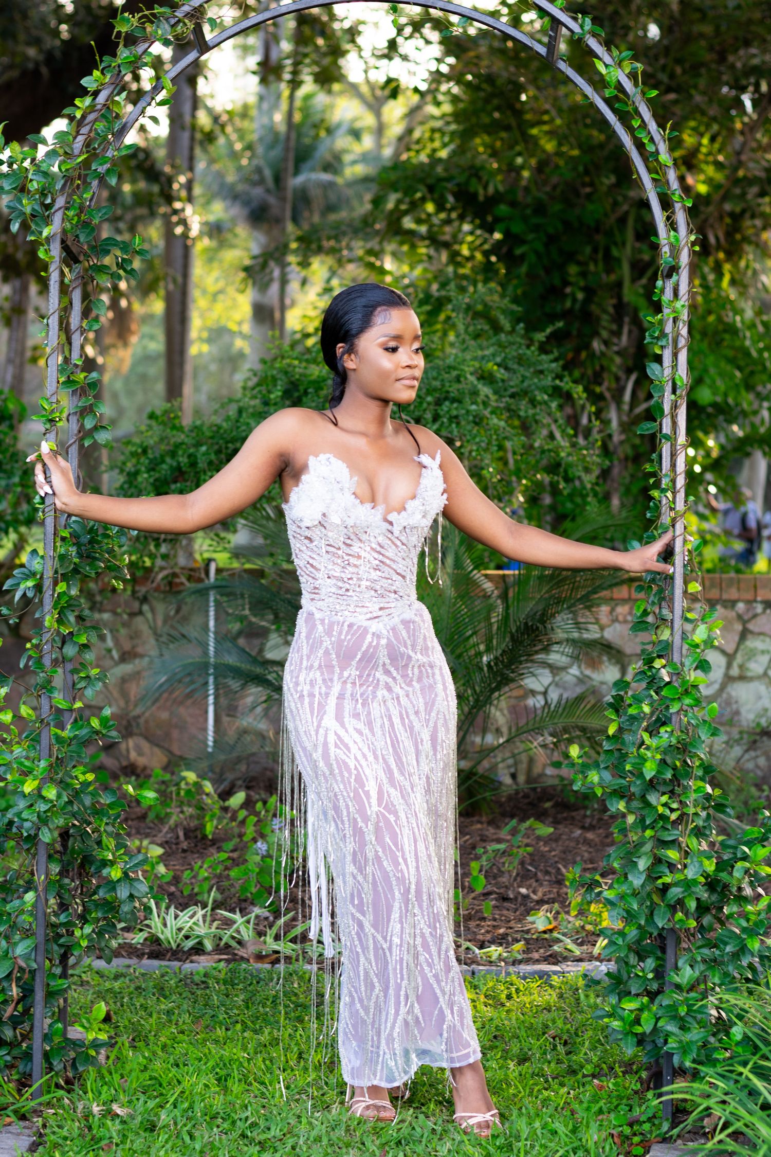 A very posed woman during a matric farewell photoshoot held on sunset in Durban.