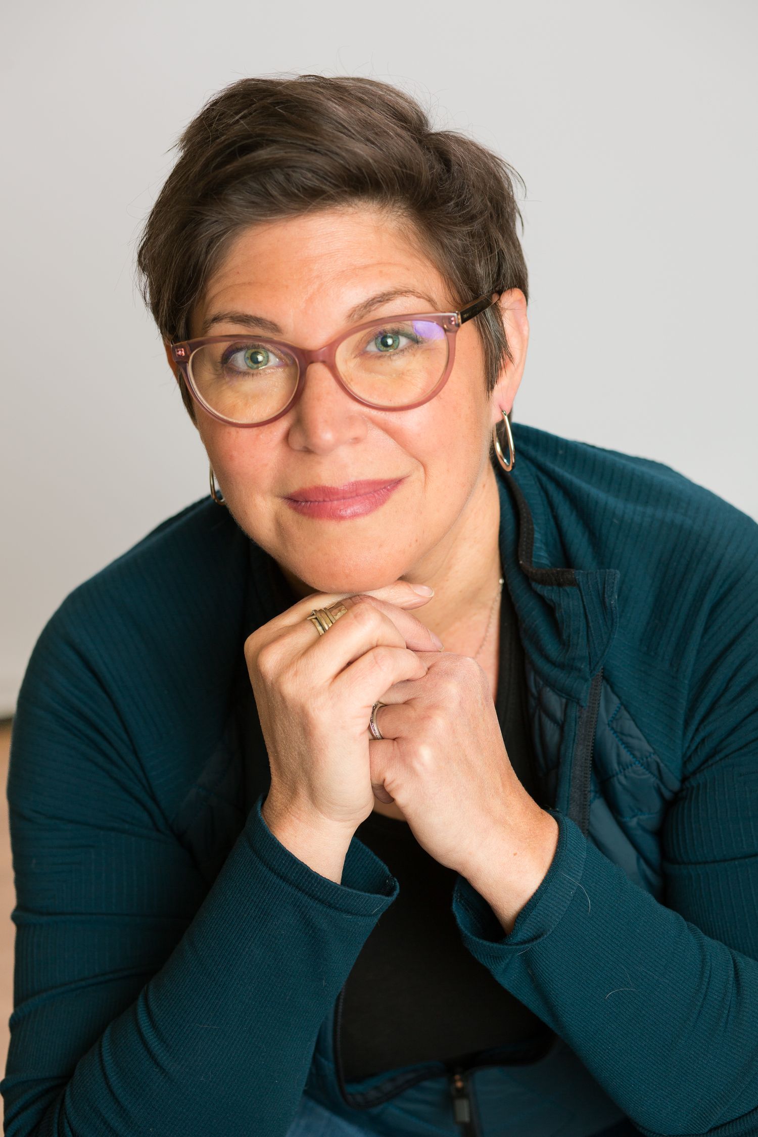 Headshot of a woman in a studio setting