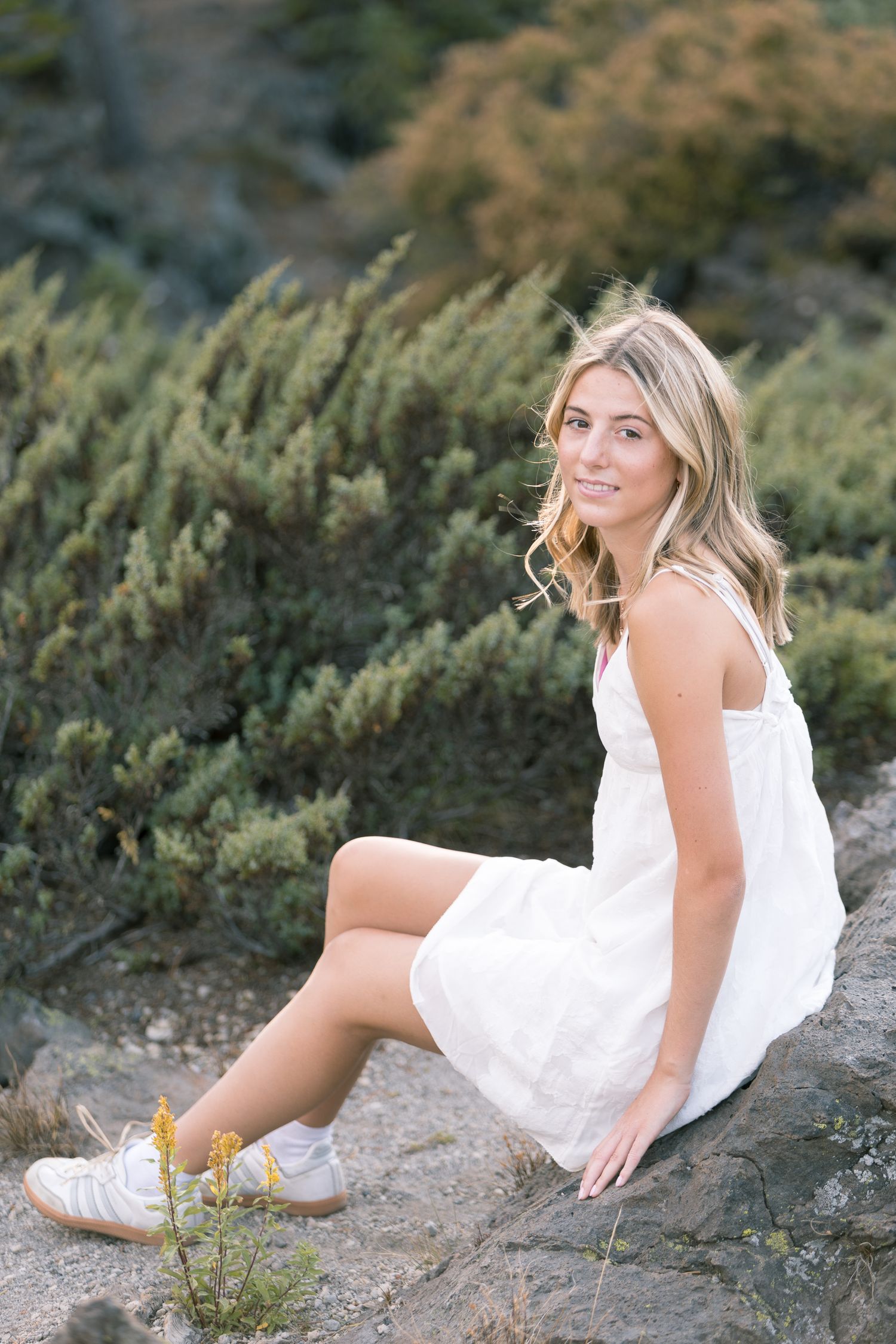Senior portrait of a young woman at Sparks Lake