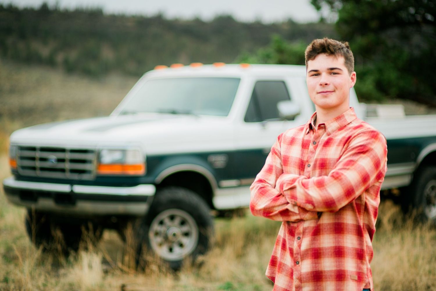 Senior photo of a young man in Prineville, Oregon