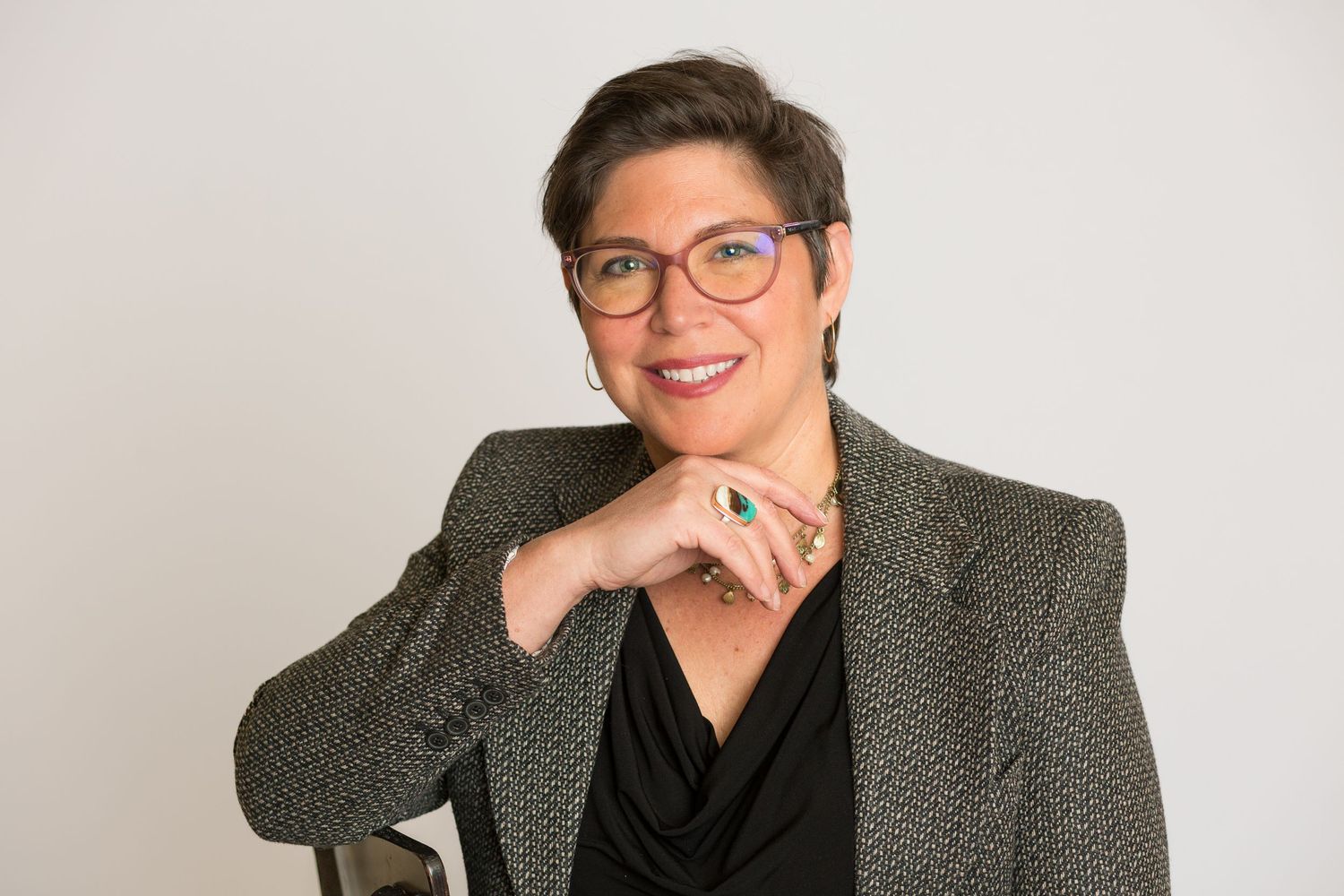 Headshot of a woman in a studio setting