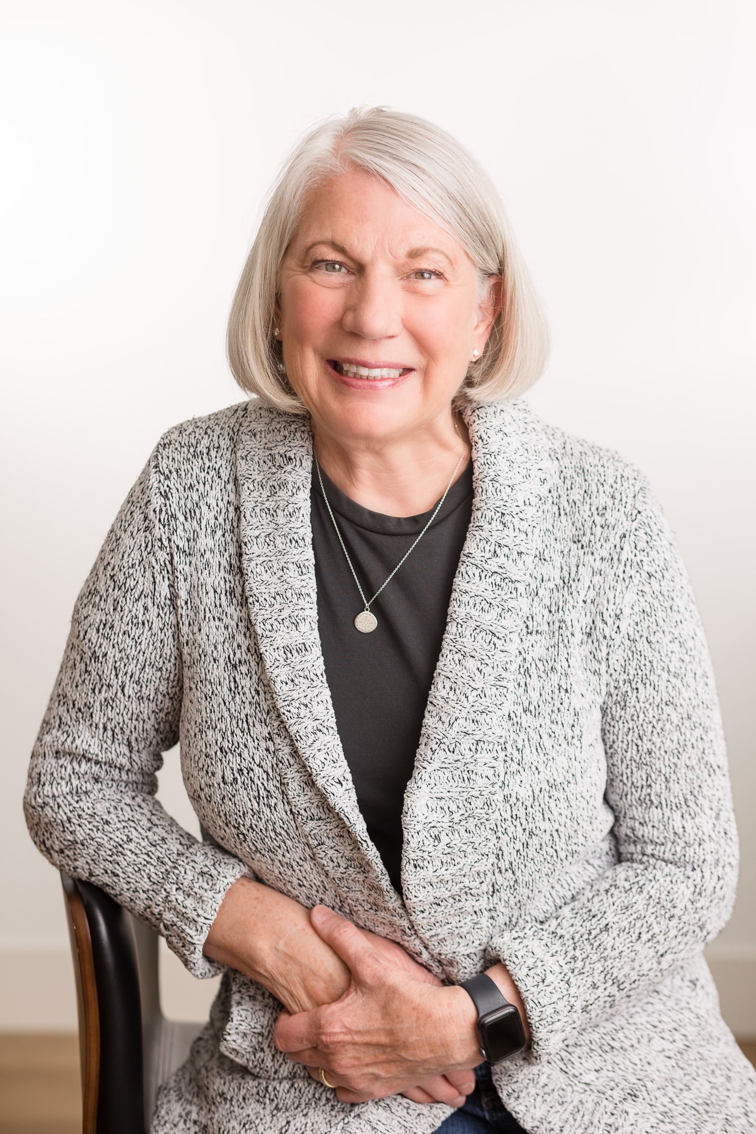 Headshot of a woman in a studio setting