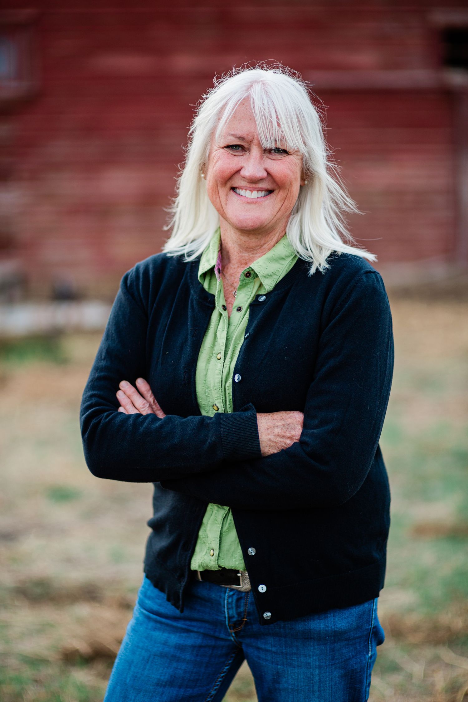 Headshot of a woman in a natural setting