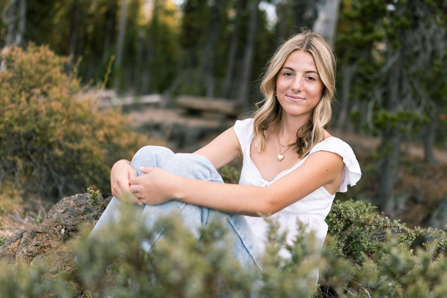 Senior photo of a young woman at Sparks Lake in Bend, Oregon