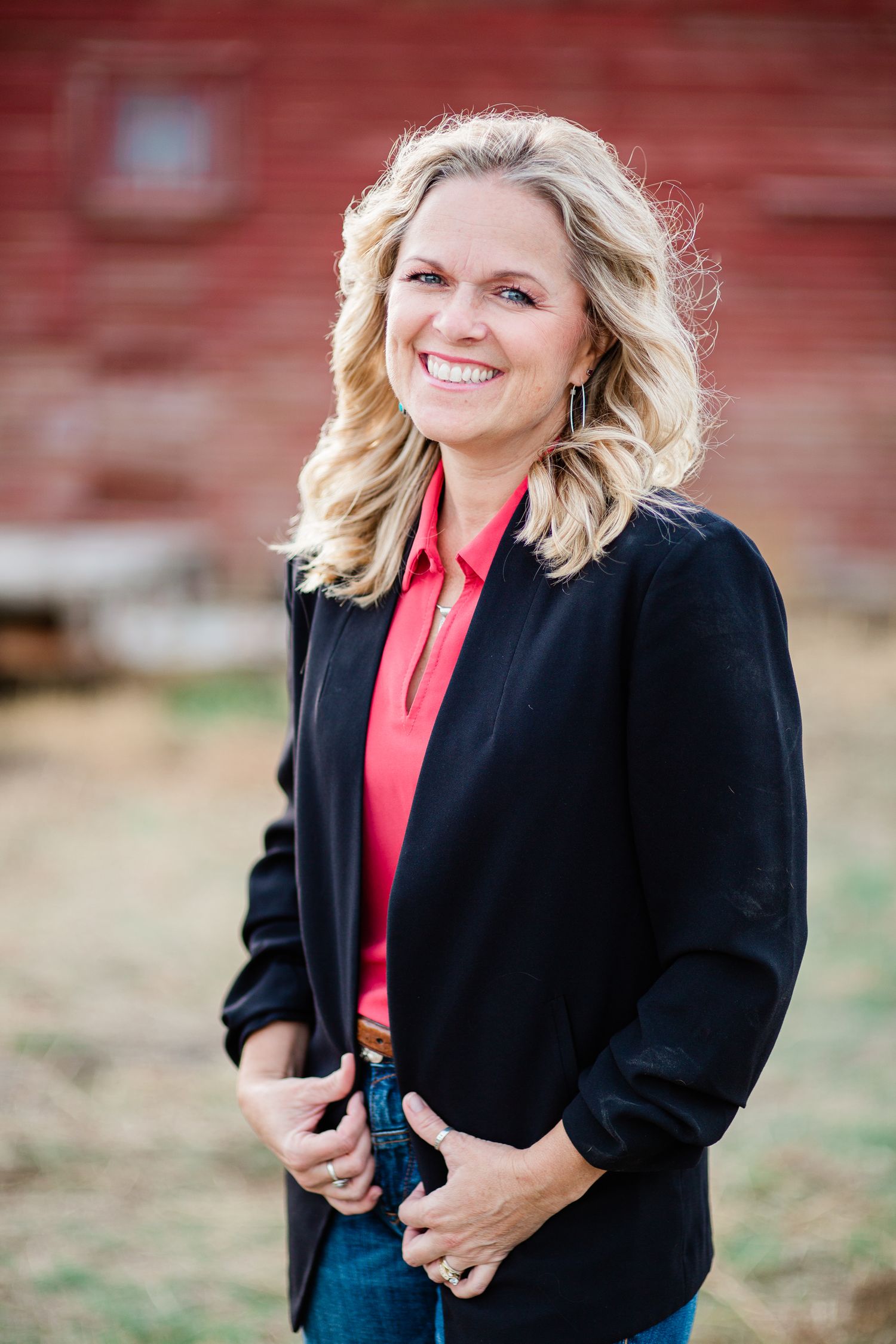 Headshot of a woman in a natural setting