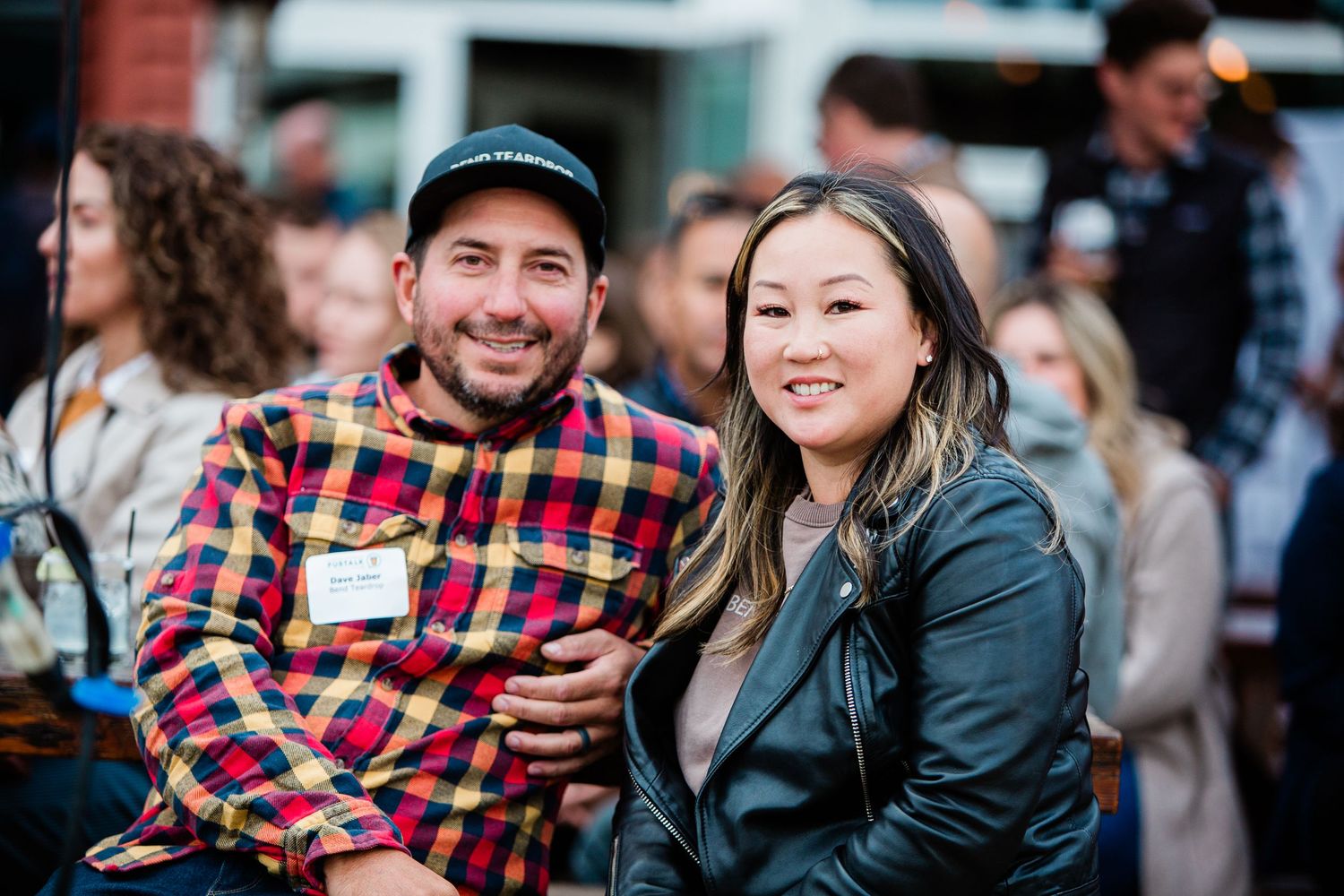 People talking at an event in Bend, Oregon