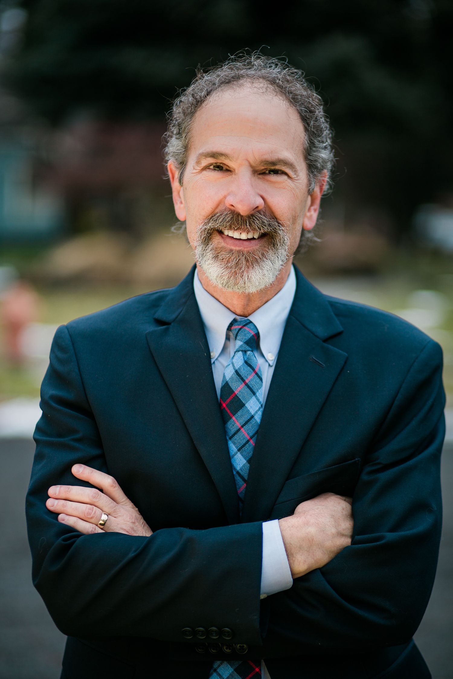Headshot of a man in a natural setting