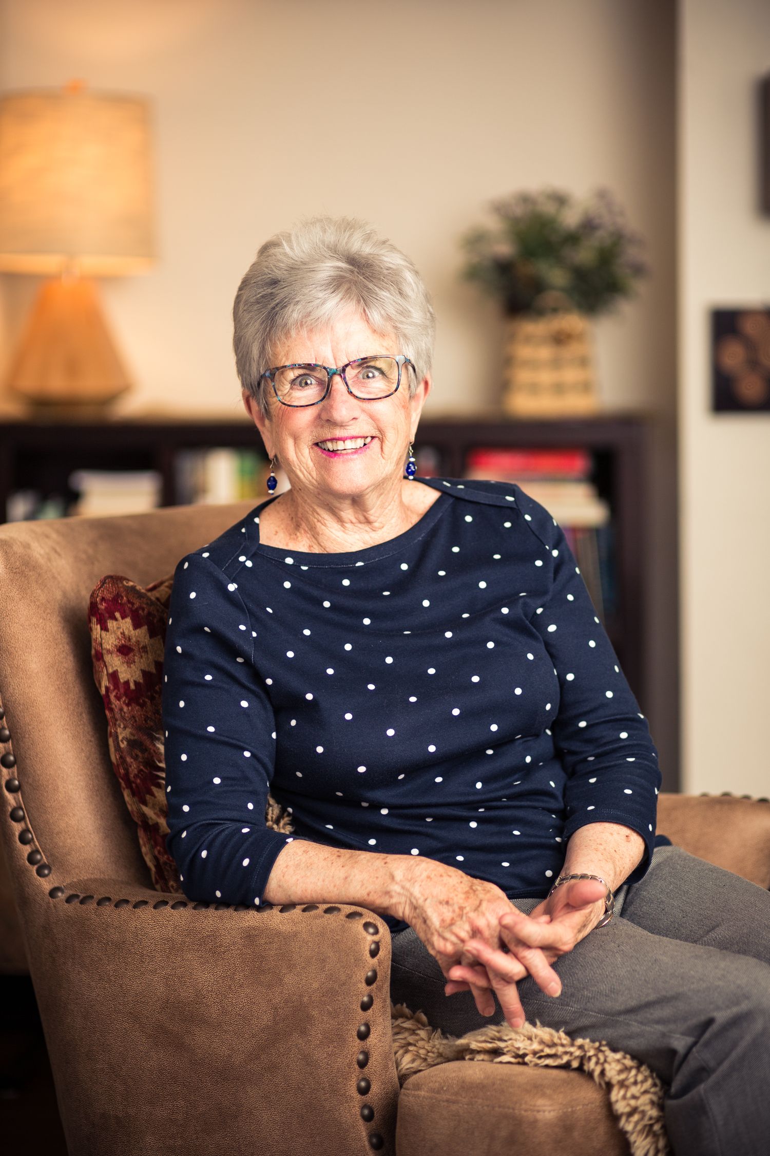 Headshot of a woman in a home setting