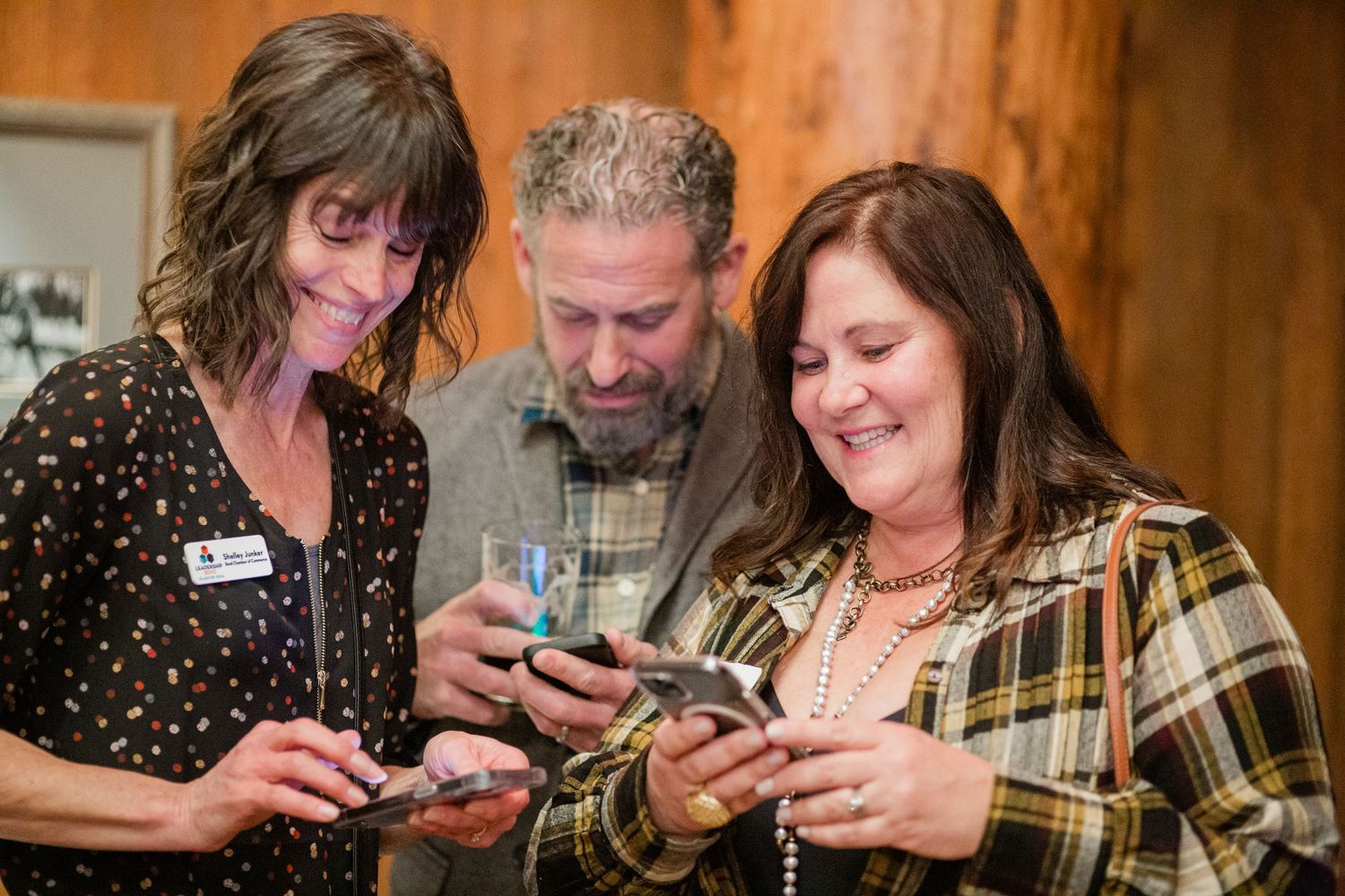 People enjoying an event at the Great Hall in Sunriver, Oregon