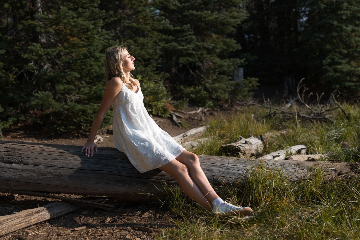 Senior portrait of a young woman at Sparks Lake