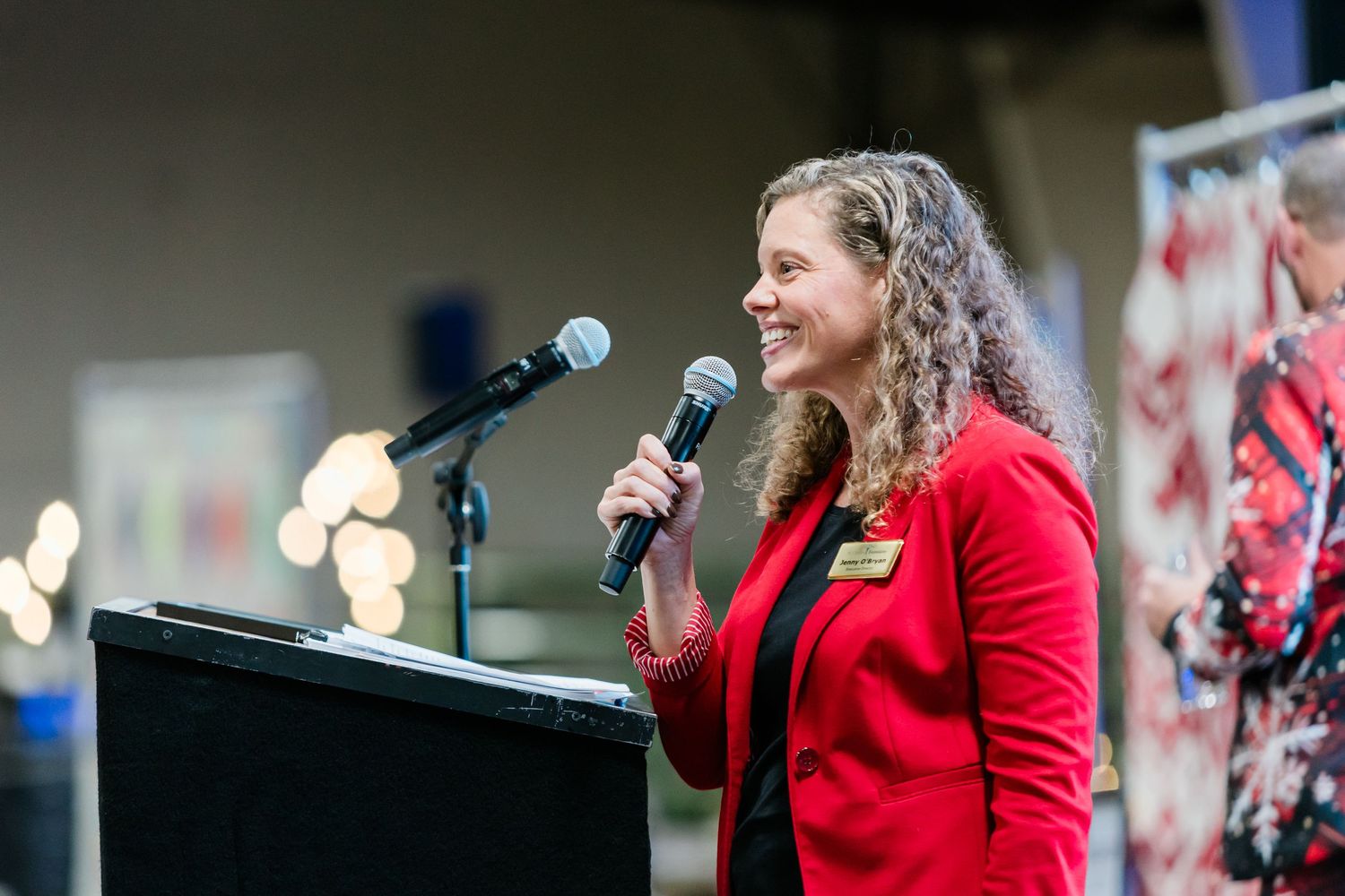 An emcee speaking at an event in Prineville, Oregon
