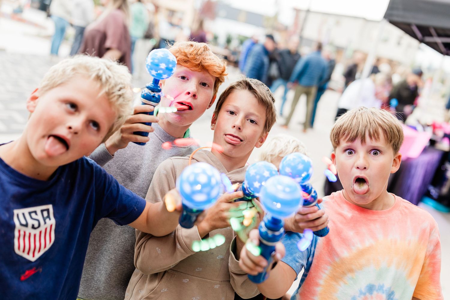 Kids making faces at an outdoor event in Bend, Oregon