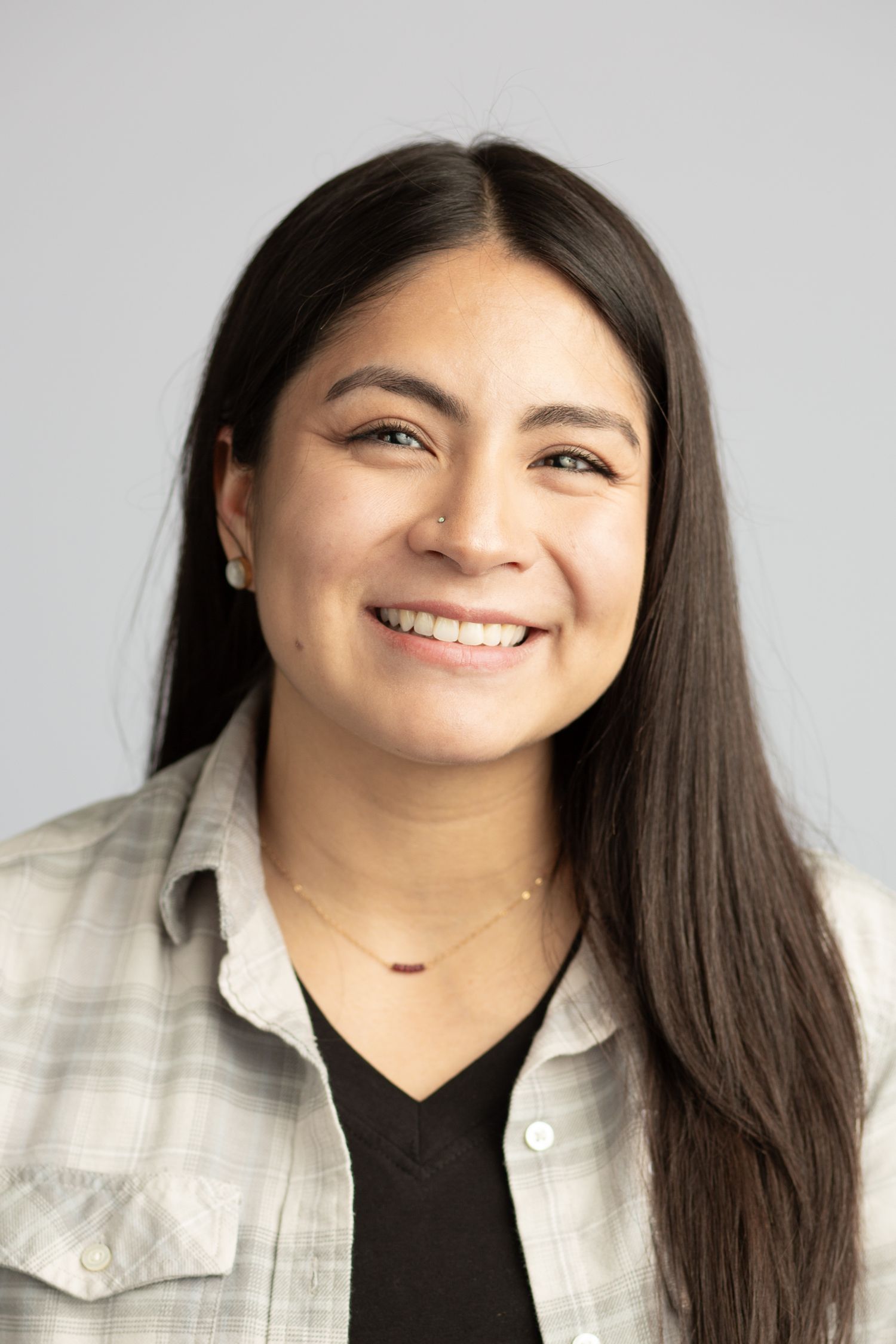 Headshot of a woman in a studio setting