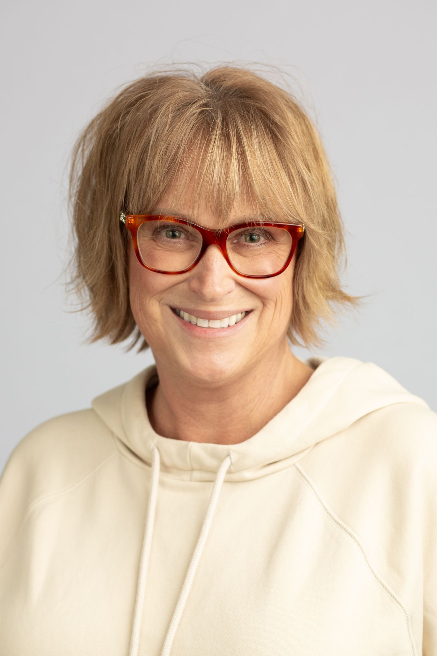 Headshot of a woman in a studio setting