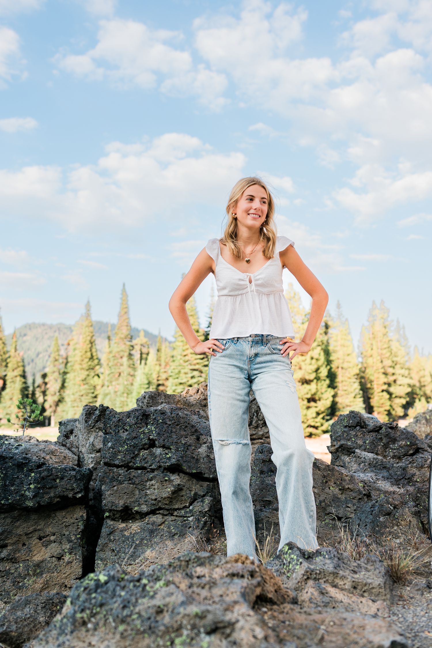 Senior portrait of a young woman at Sparks Lake