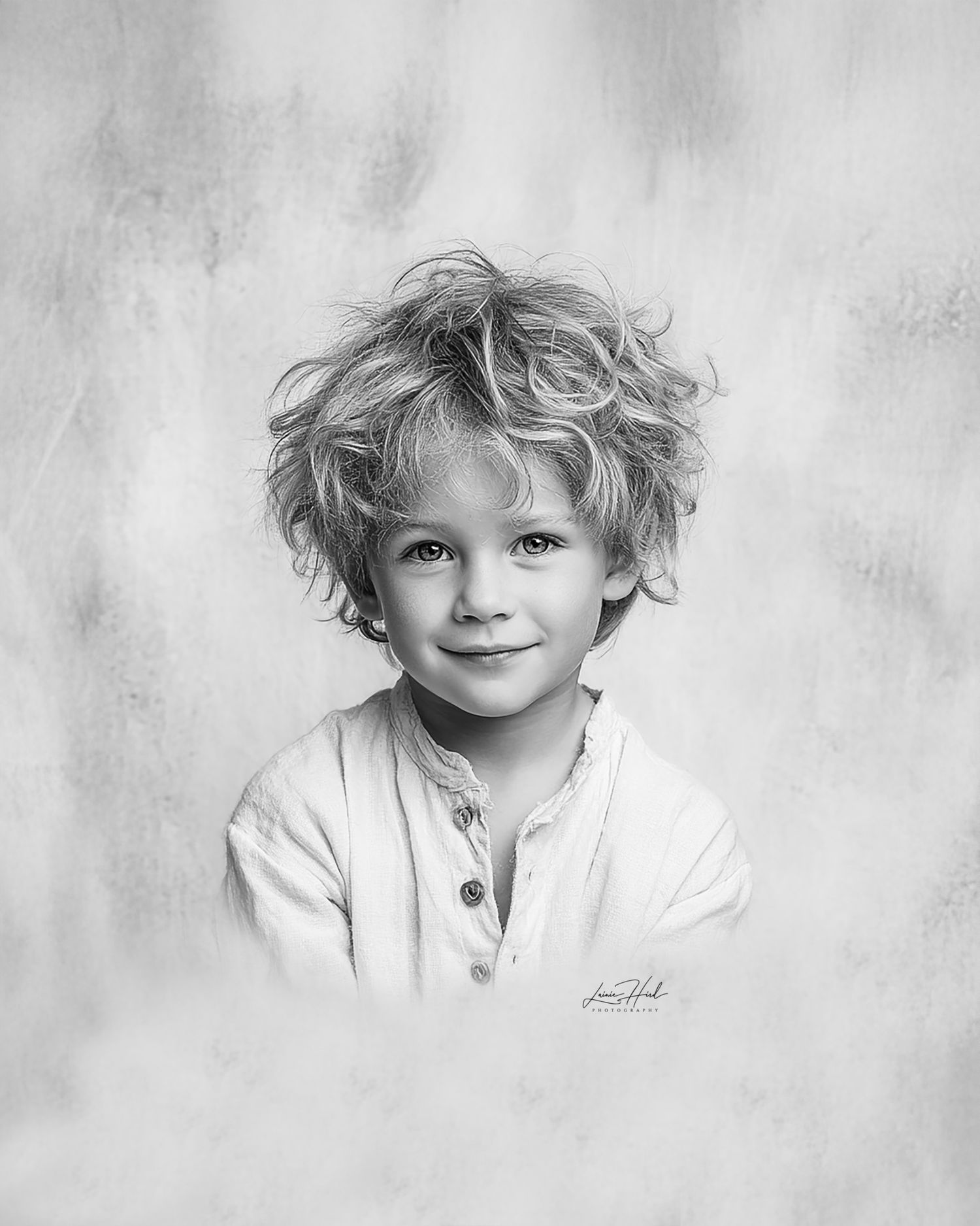 Black and white portrait series showing a young child with tousled blonde hair making playful expressions.