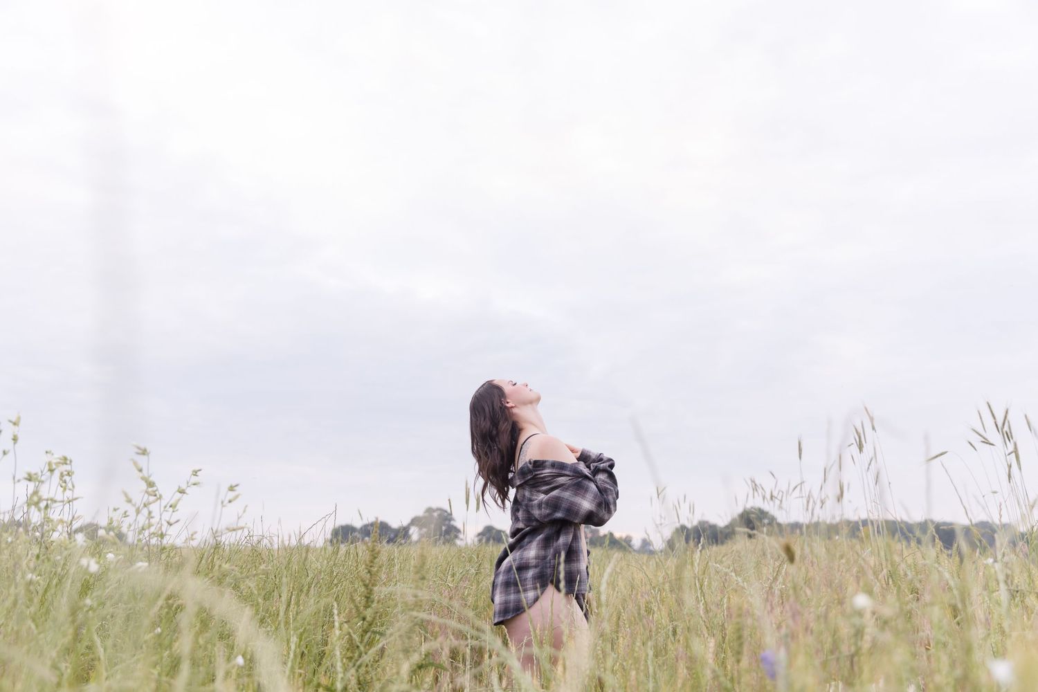 Artistic outdoor photography series in a natural meadow setting.