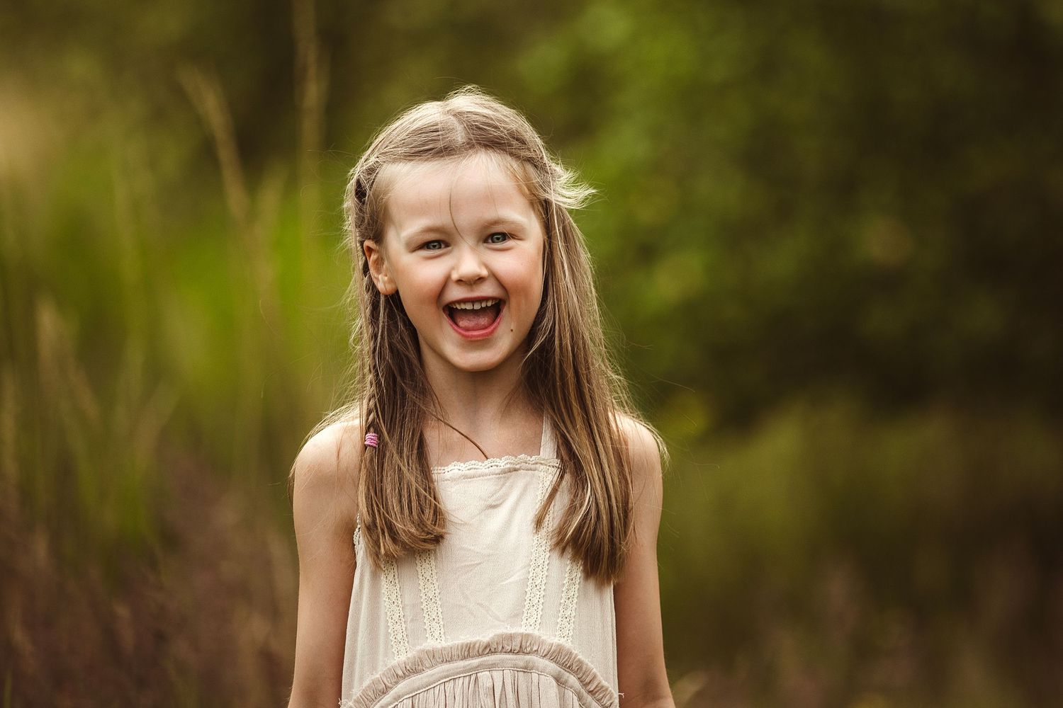 Series of candid expressions captured in natural outdoor lighting.