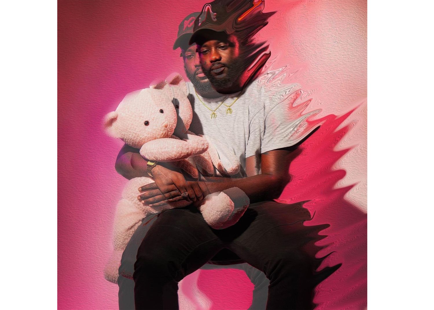 Young man holding a white teddy bear poses against a vibrant pink background in a casual white t-shirt.
