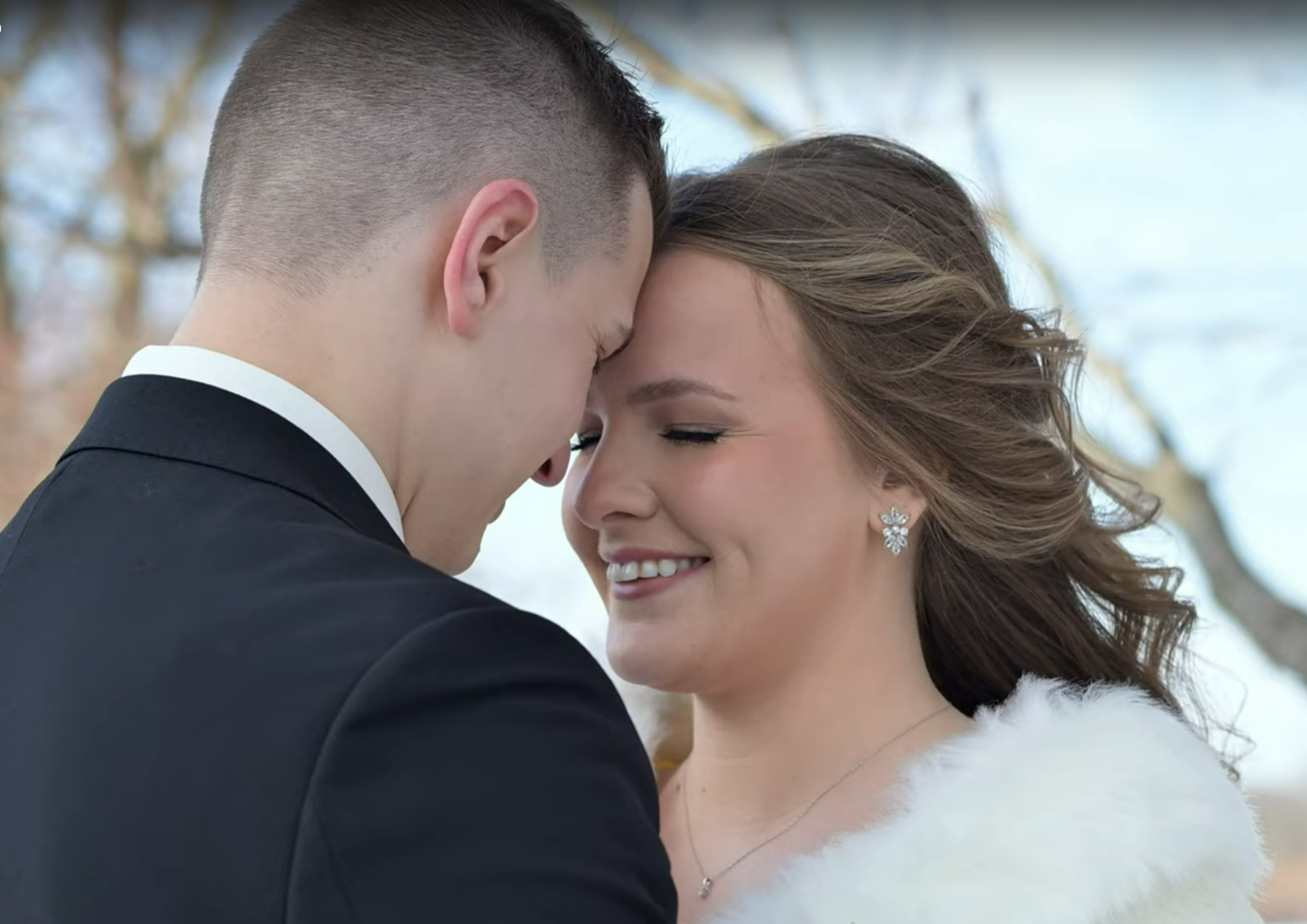 Close-up wedding portraits showing intimate moments between newlyweds.