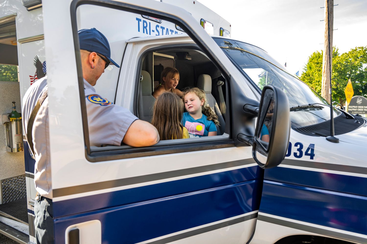 Police vehicle parked at a community event providing security and support.