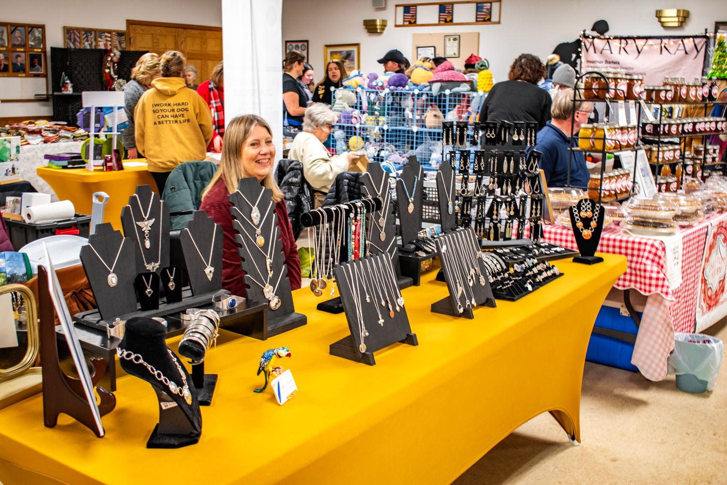 Sporting goods store interior showing racks of skis and winter equipment for sale.