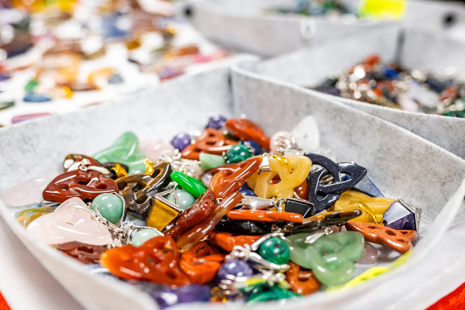 Colorful wrapped candies scattered on a light surface.