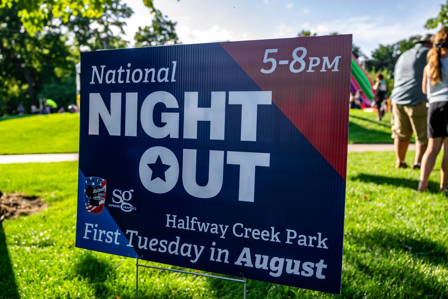 Event signage for National Night Out at Halfway Creek Park.