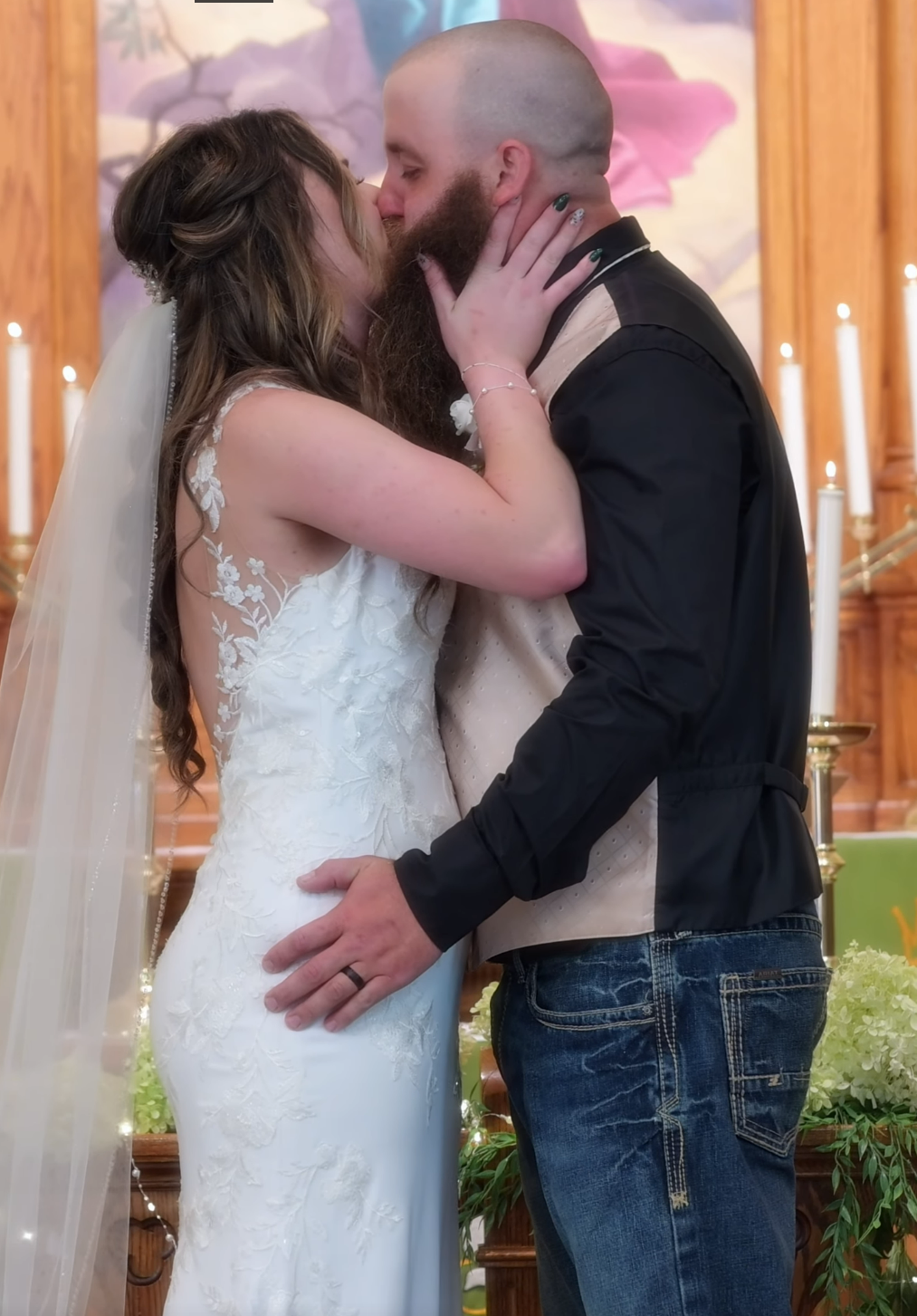 A series of romantic first kiss moments at a wedding ceremony with candlelit decor.