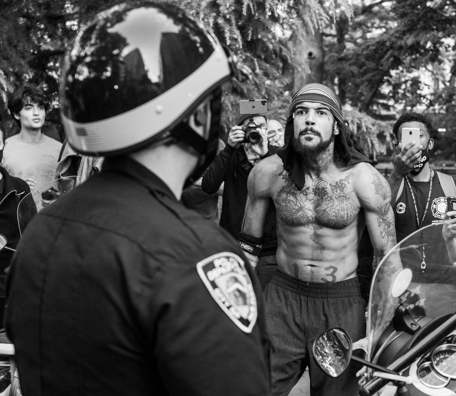 Man aggressively confronting a NYPD police officer