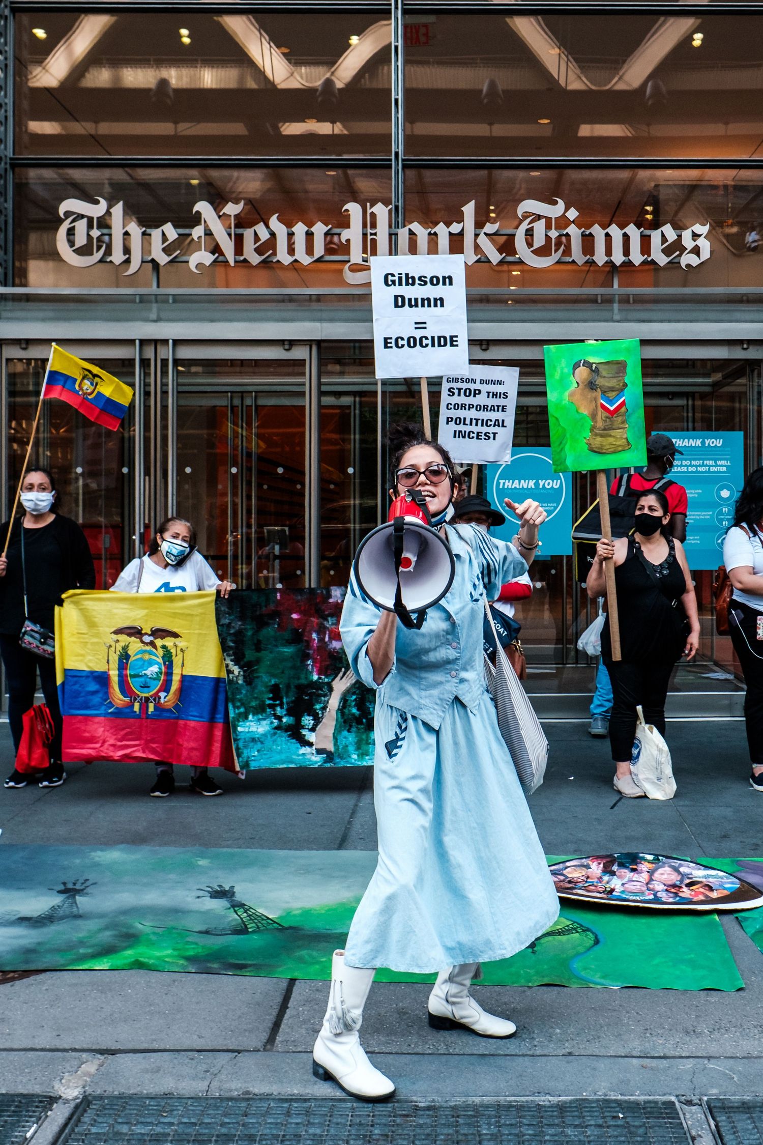 Climate activists in front of the New York Times building