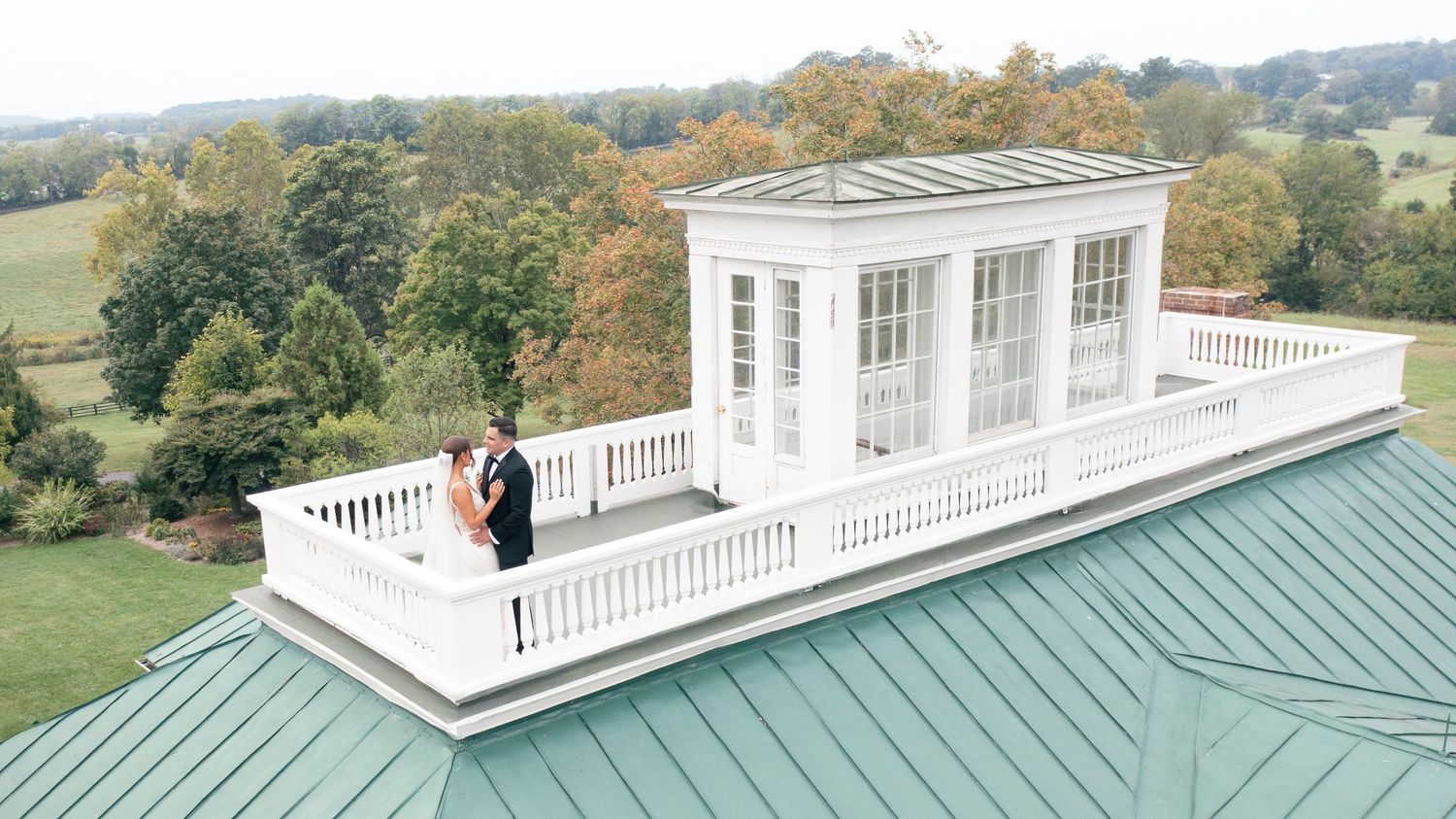 Bride and groom sharing a romantic, timeless moment at Long Branch Historic House, Northern VA, photographed by wedding photographer