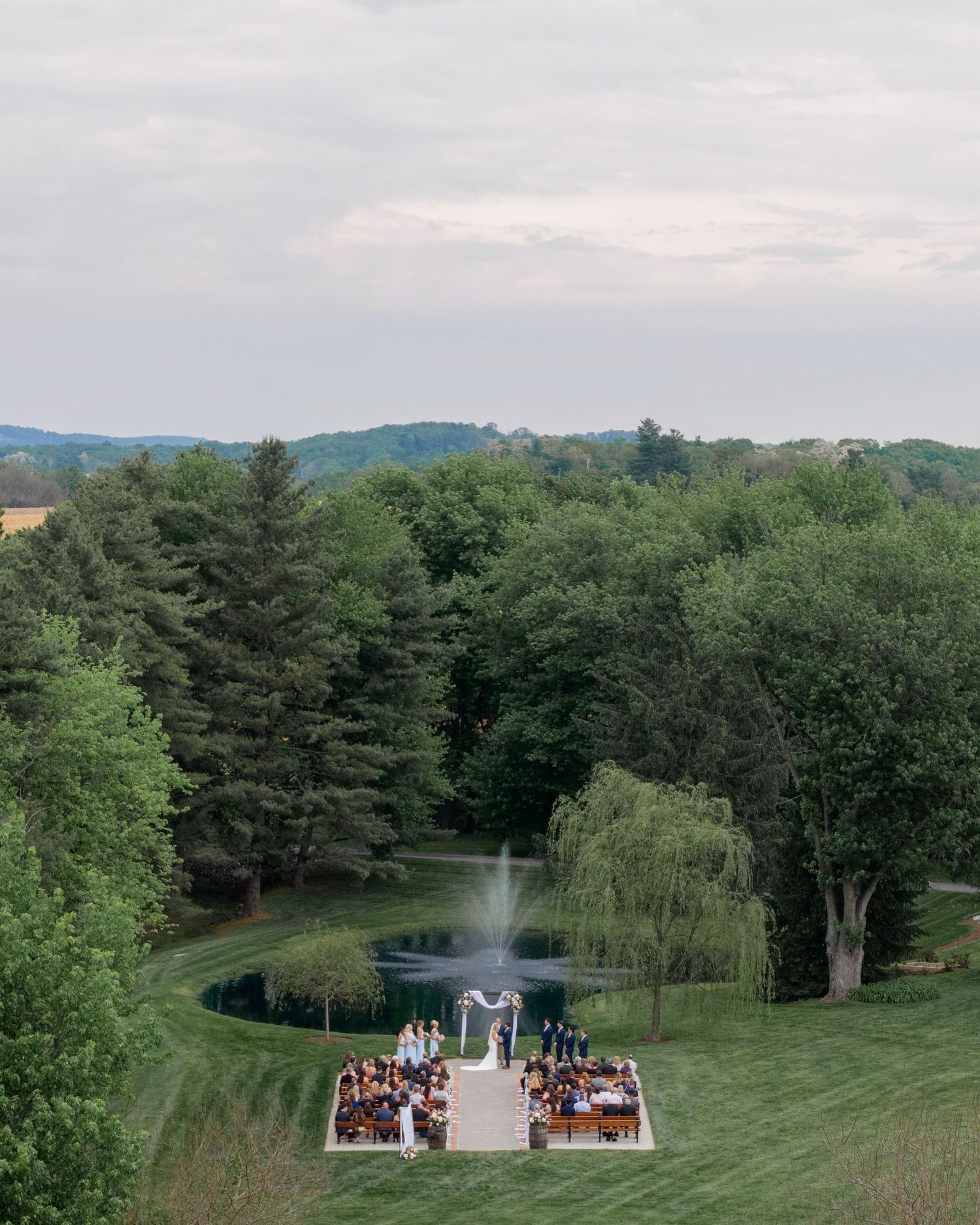 Drone view of an outdoor wedding ceremony at Christian Royer House in Westminster, Maryland