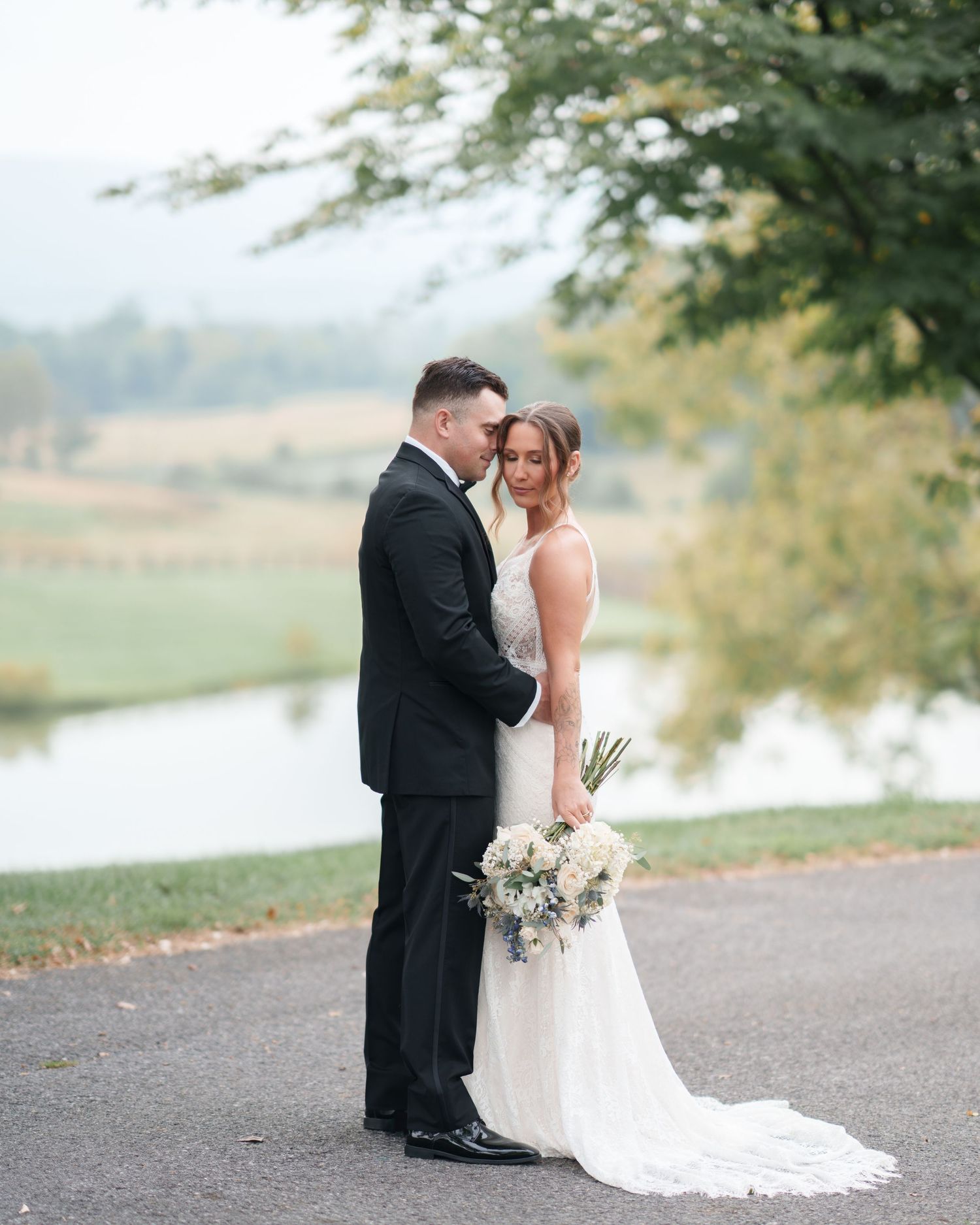 Bride and groom sharing a romantic, timeless moment at Long Branch Historic House, Northern VA