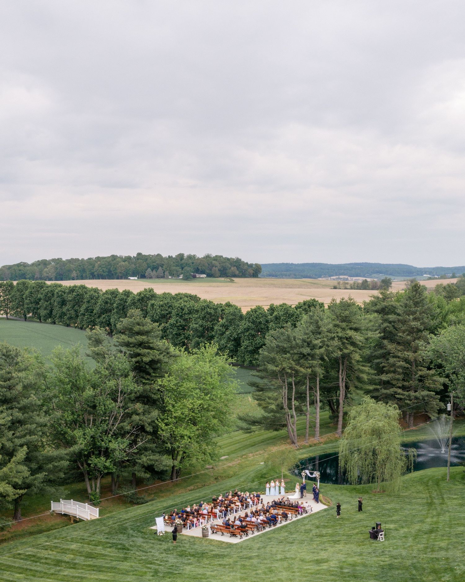 Drone view of an outdoor wedding ceremony at Christian Royer House in Westminster, Maryland