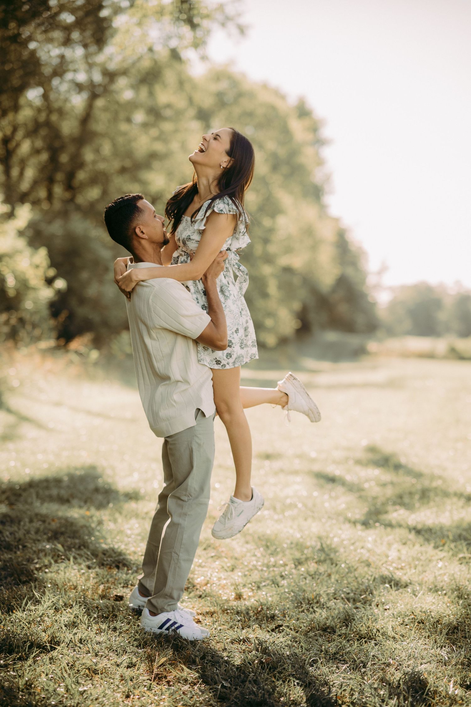 Outdoor engagement couple portrait in Manassas battlefield at golden hour
