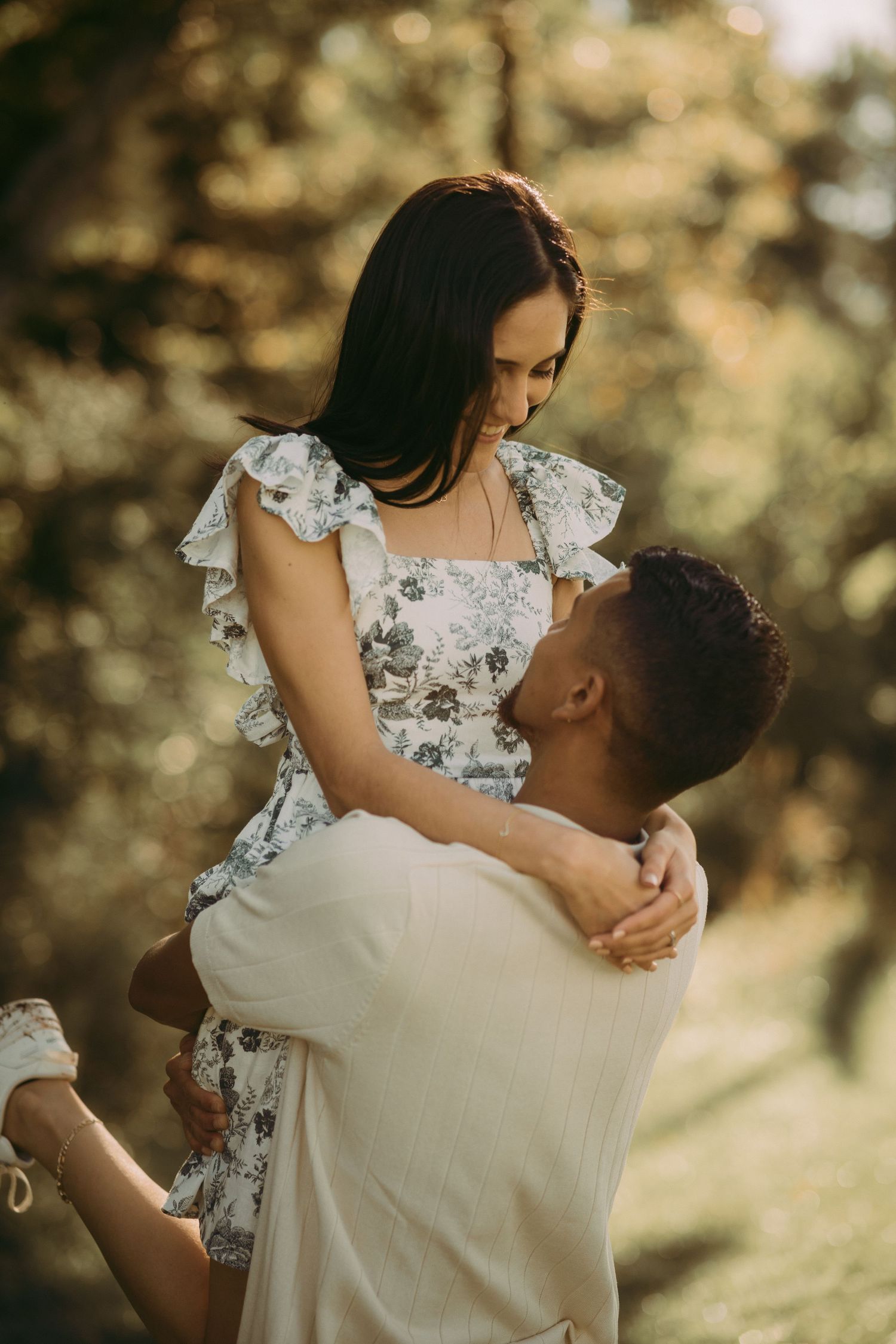 Outdoor engagement couple portrait in Manassas battlefield at golden hour