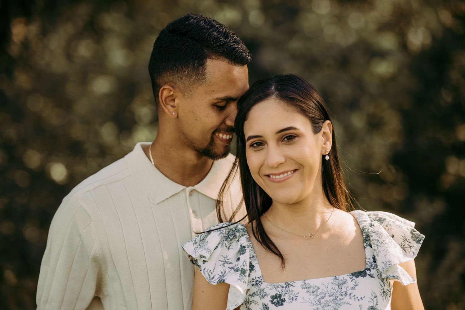 Outdoor engagement couple portrait in Manassas battlefield at golden hour