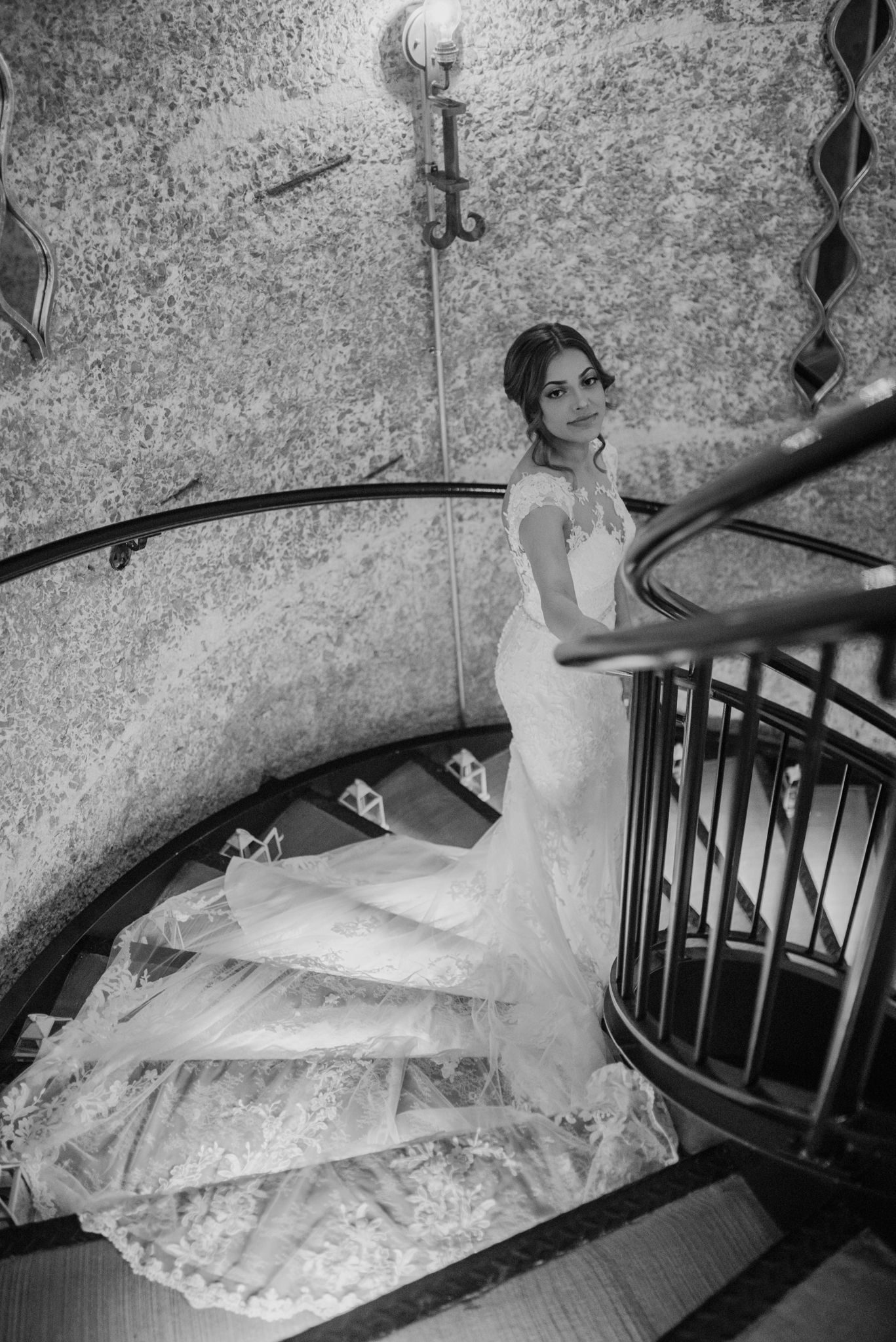 Black and white bride portrait on a staircase in Sweeney barn
