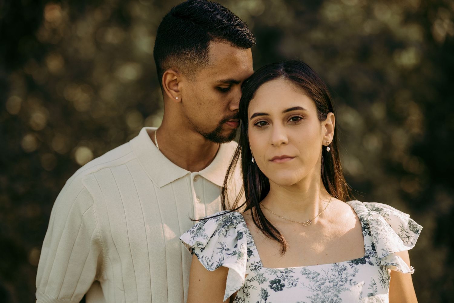 Outdoor engagement couple portrait in Manassas battlefield at golden hour