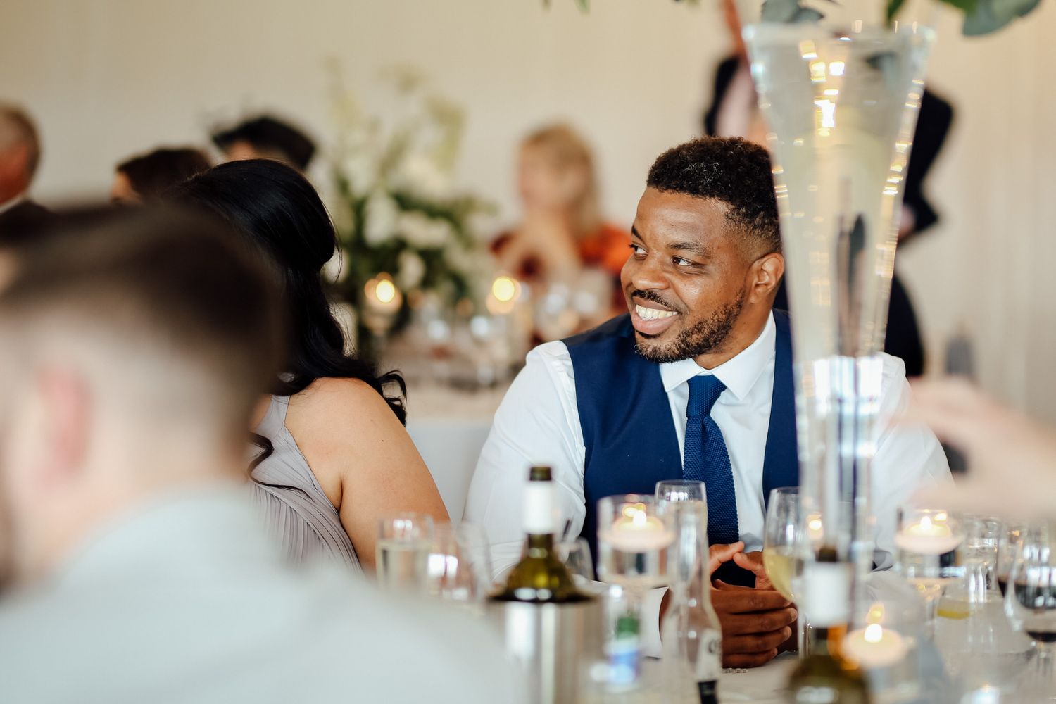 guet laughing at table