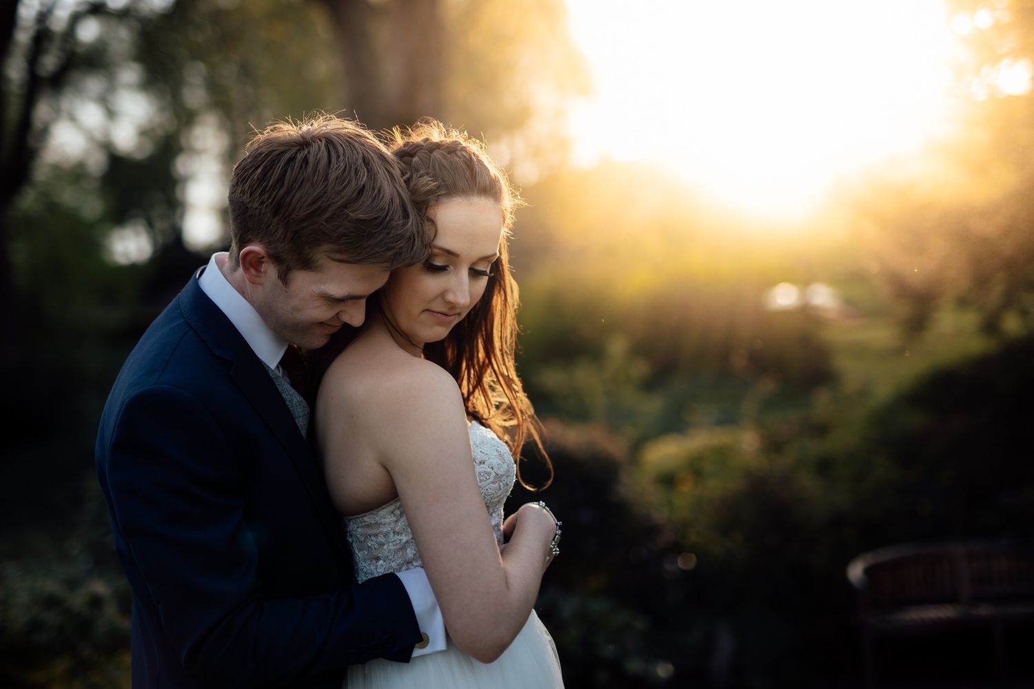 Romantic sunset portrait with golden hour lighting in outdoor setting.