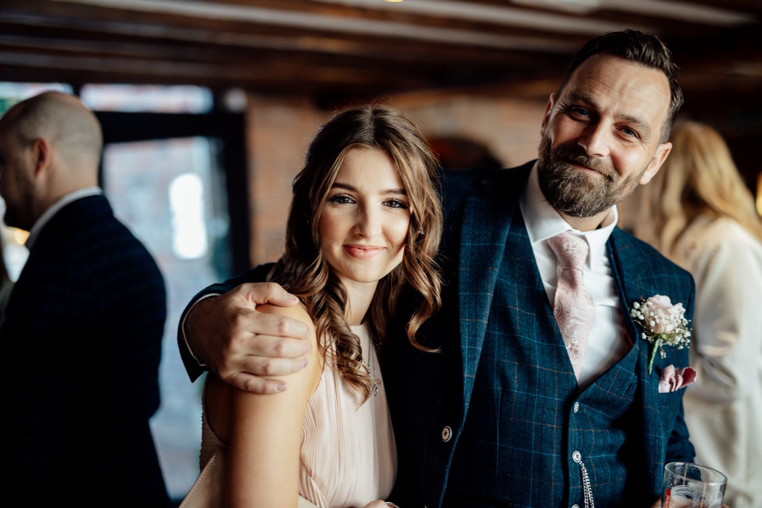 Intimate wedding reception moments in an elegant rustic venue setting.